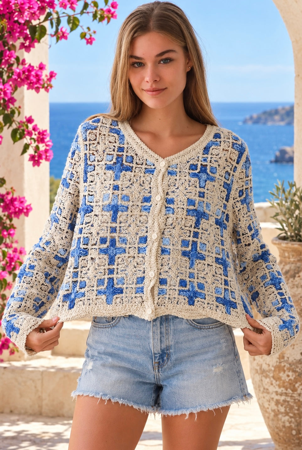 Blue and ivory cotton crochet boho cardigan with intricate open weave, V-neck, buttons and scalloped edging