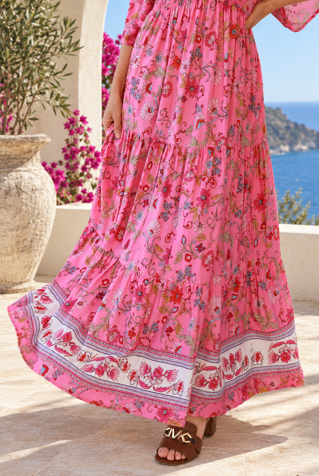Eliana Bloom pink floral rayon boho maxi dress with V-neckline, smocked waist and tiered skirt.