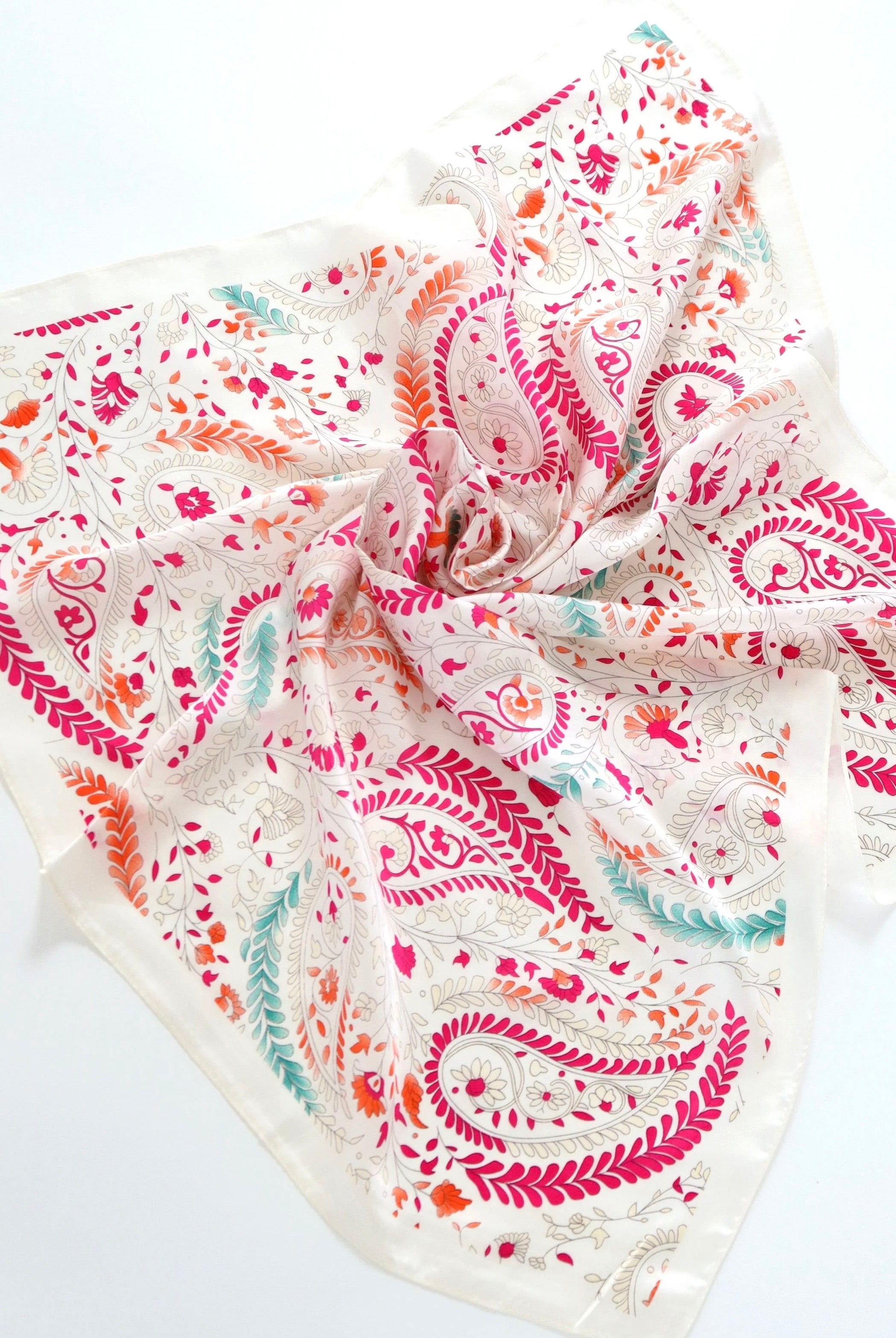 Camille Floral Paisley Bandana Scarf worn as a floral head scarf and bandeau top in blush pink paisley print