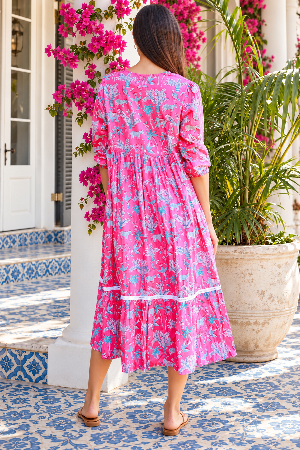 Mahale Sanctuary Midi Dress Pluto Pink in 100% cotton with turquoise wildlife print, white lace trim and frill hem