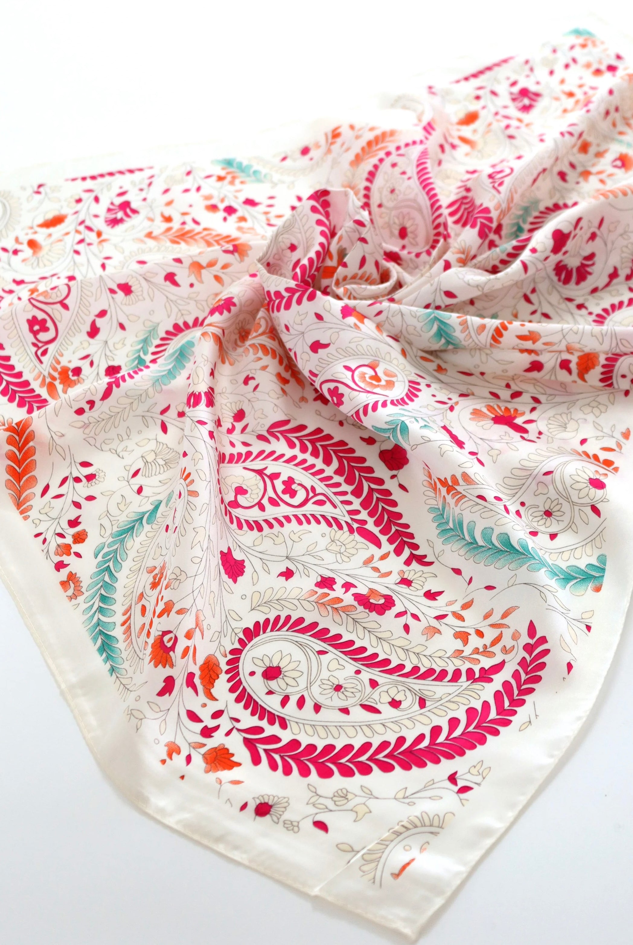 Camille Floral Paisley Bandana Scarf worn as a floral head scarf and bandeau top in blush pink paisley print