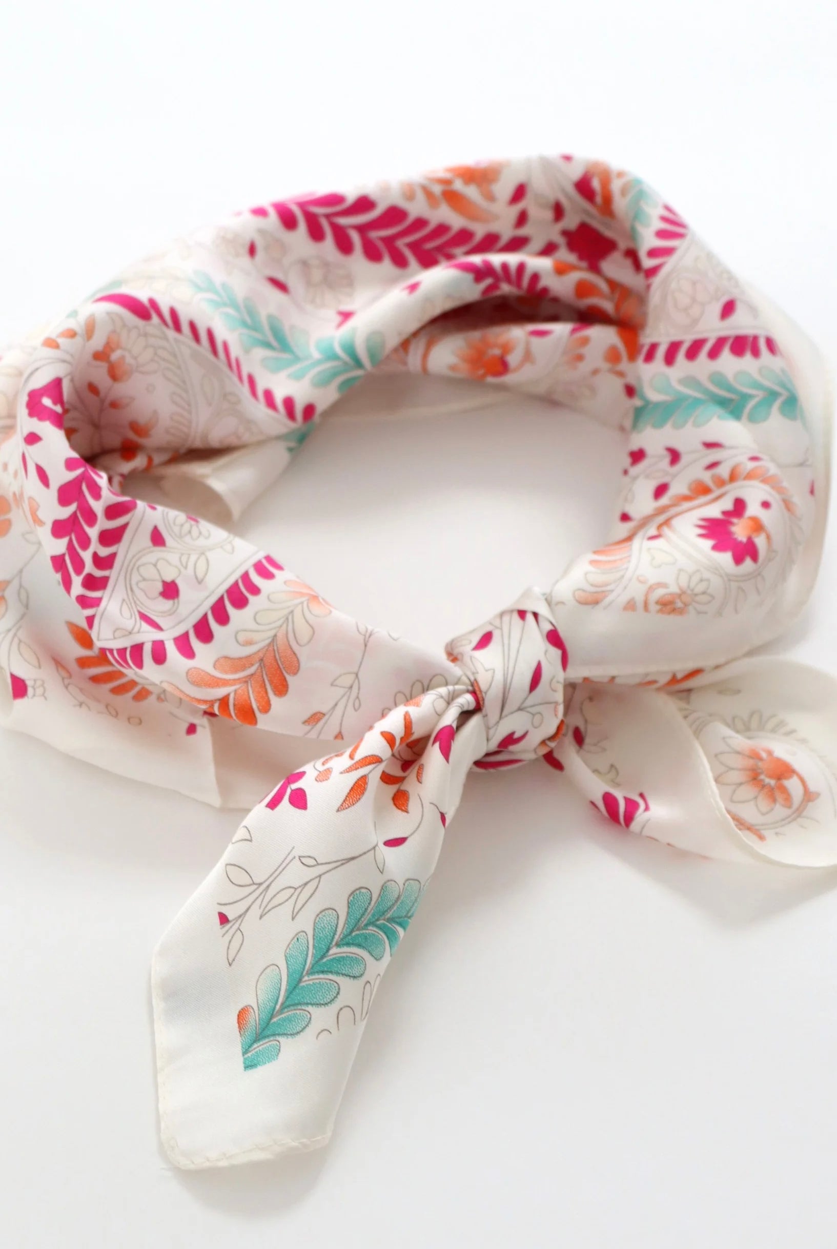 Camille Floral Paisley Bandana Scarf worn as a floral head scarf and bandeau top in blush pink paisley print