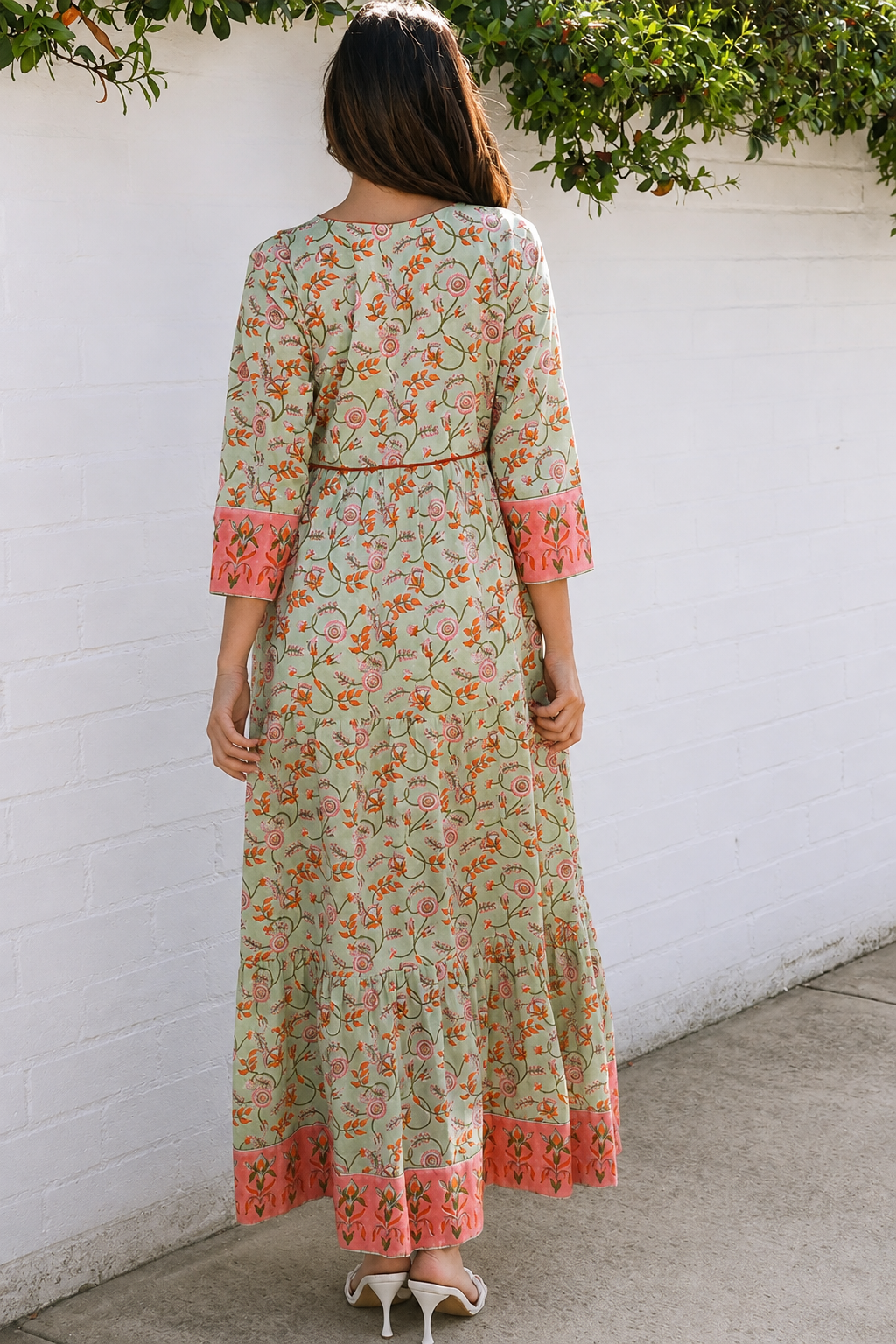 Lauren 100% cotton floral boho maxi dress in sage green with coral botanical print, tassel ties and contrast border hem