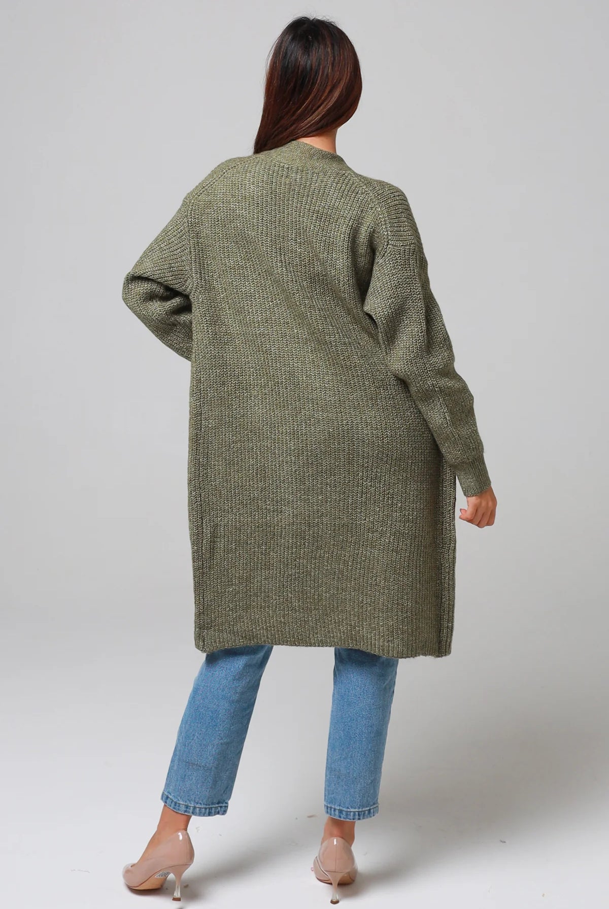 Woman in Khaki longline cardigan with patch pockets and denim - earthy boho wool blend knitwear Australia.