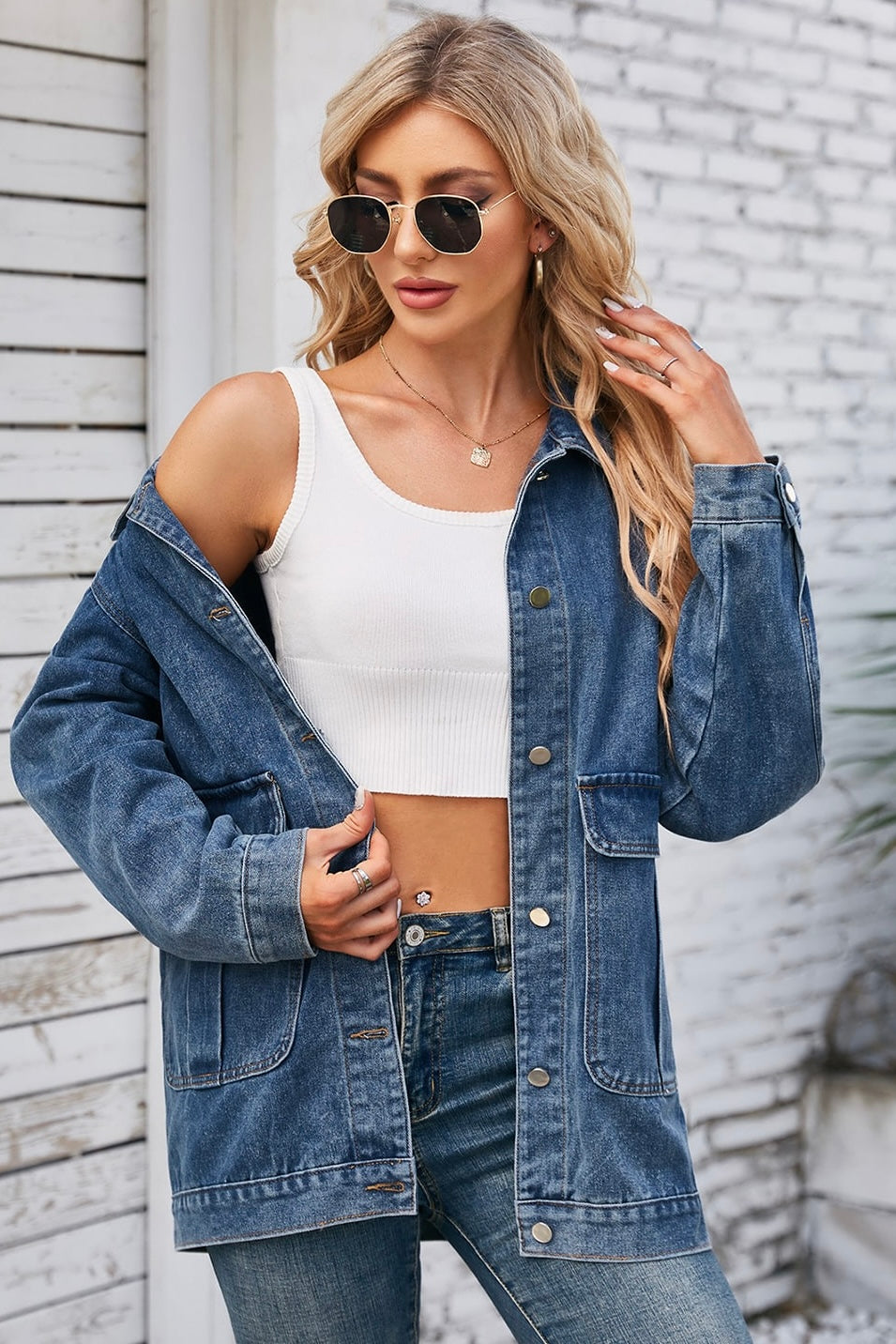 Oversized two-tone blue denim jacket with patch pockets worn over denim jeans - Bohemian Style Australia.