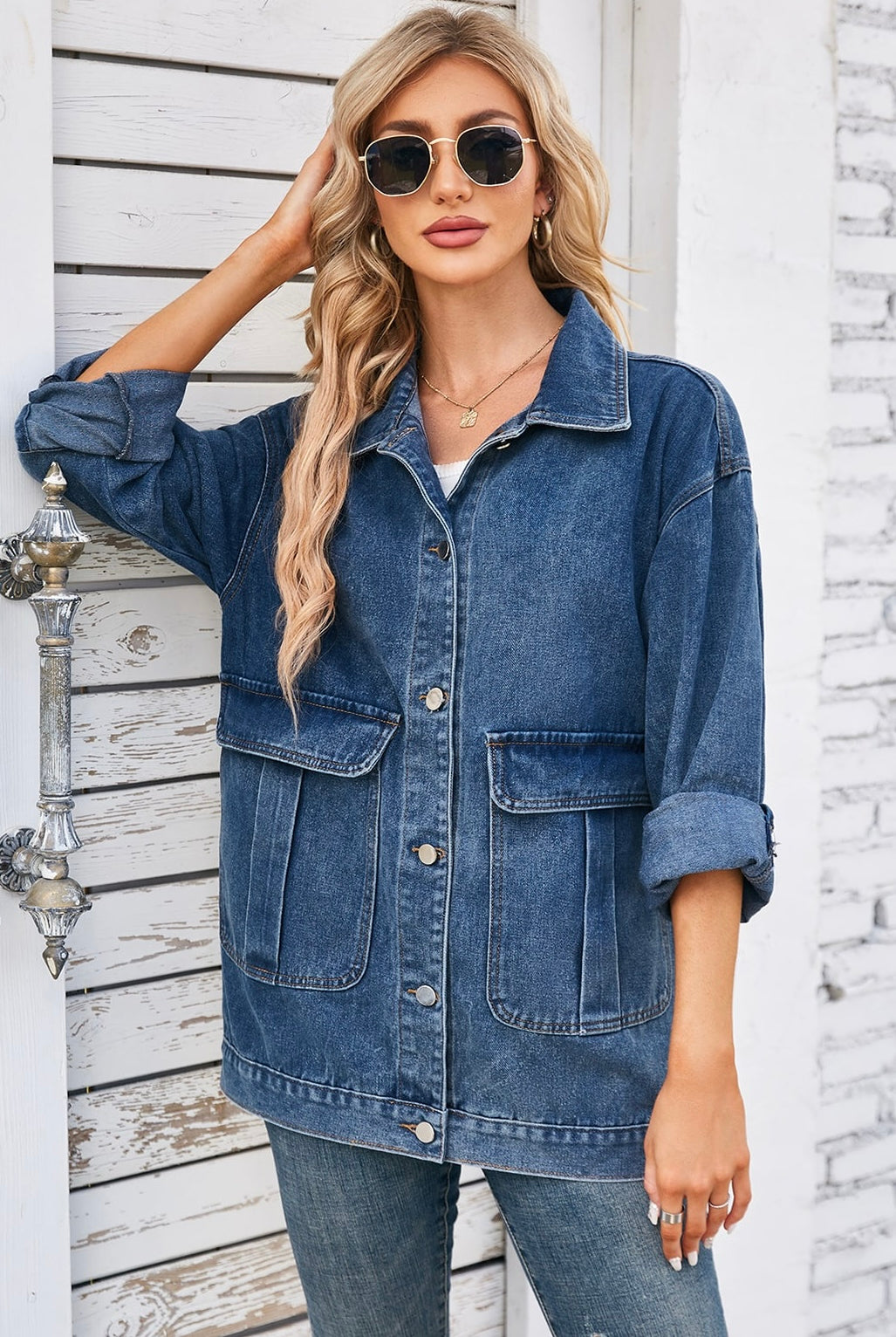 Oversized two-tone blue denim jacket with patch pockets worn over denim jeans - Bohemian Style Australia.
