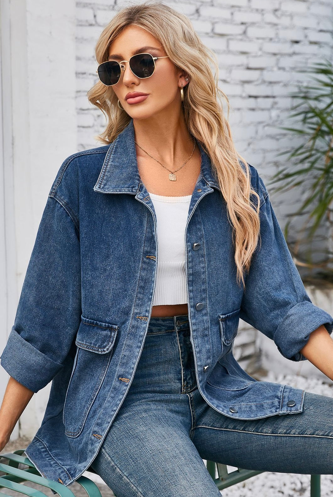 Oversized two-tone blue denim jacket with patch pockets worn over denim jeans - Bohemian Style Australia.