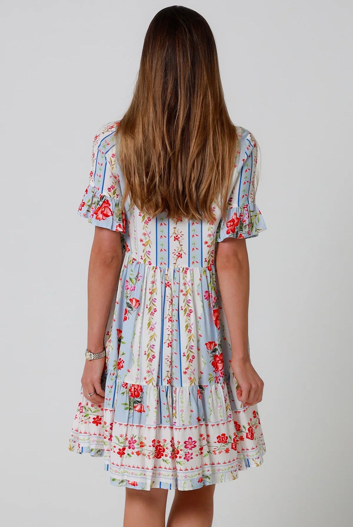 Boho mini dress with tassels v-neckline frill sleeves and border print in florals - Cherry Blossom Mini Dress Australia
