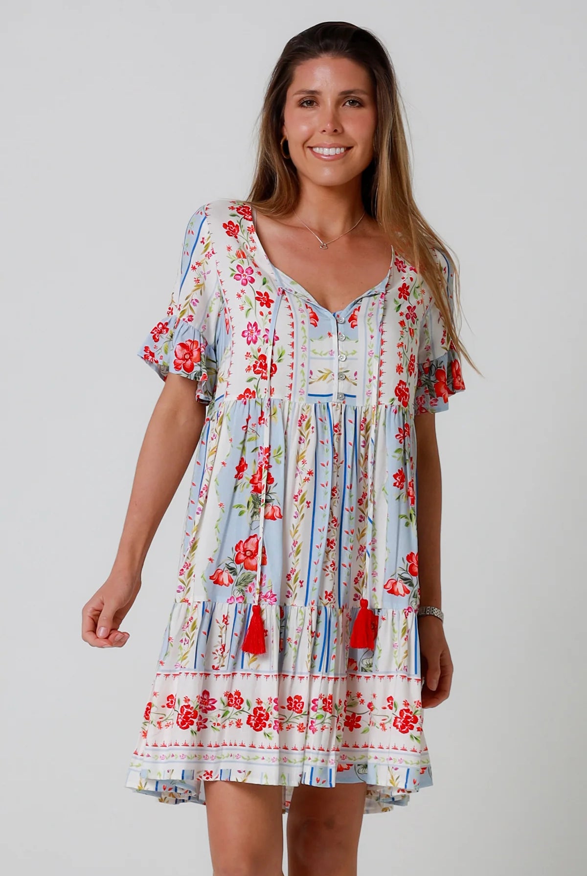 Boho mini dress with tassels v-neckline frill sleeves and border print in florals - Cherry Blossom Mini Dress Australia