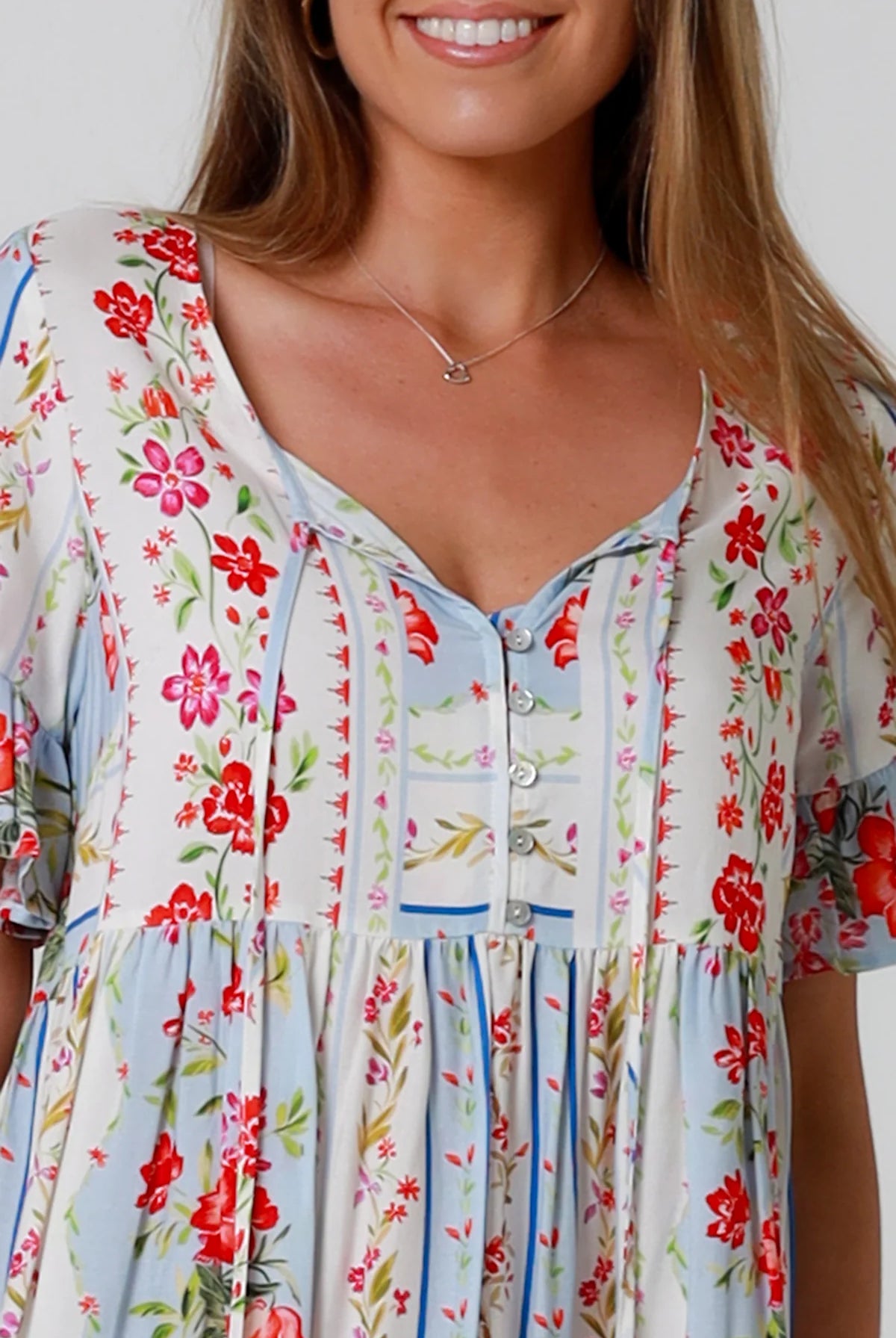 Boho mini dress with tassels v-neckline frill sleeves and border print in florals - Cherry Blossom Mini Dress Australia