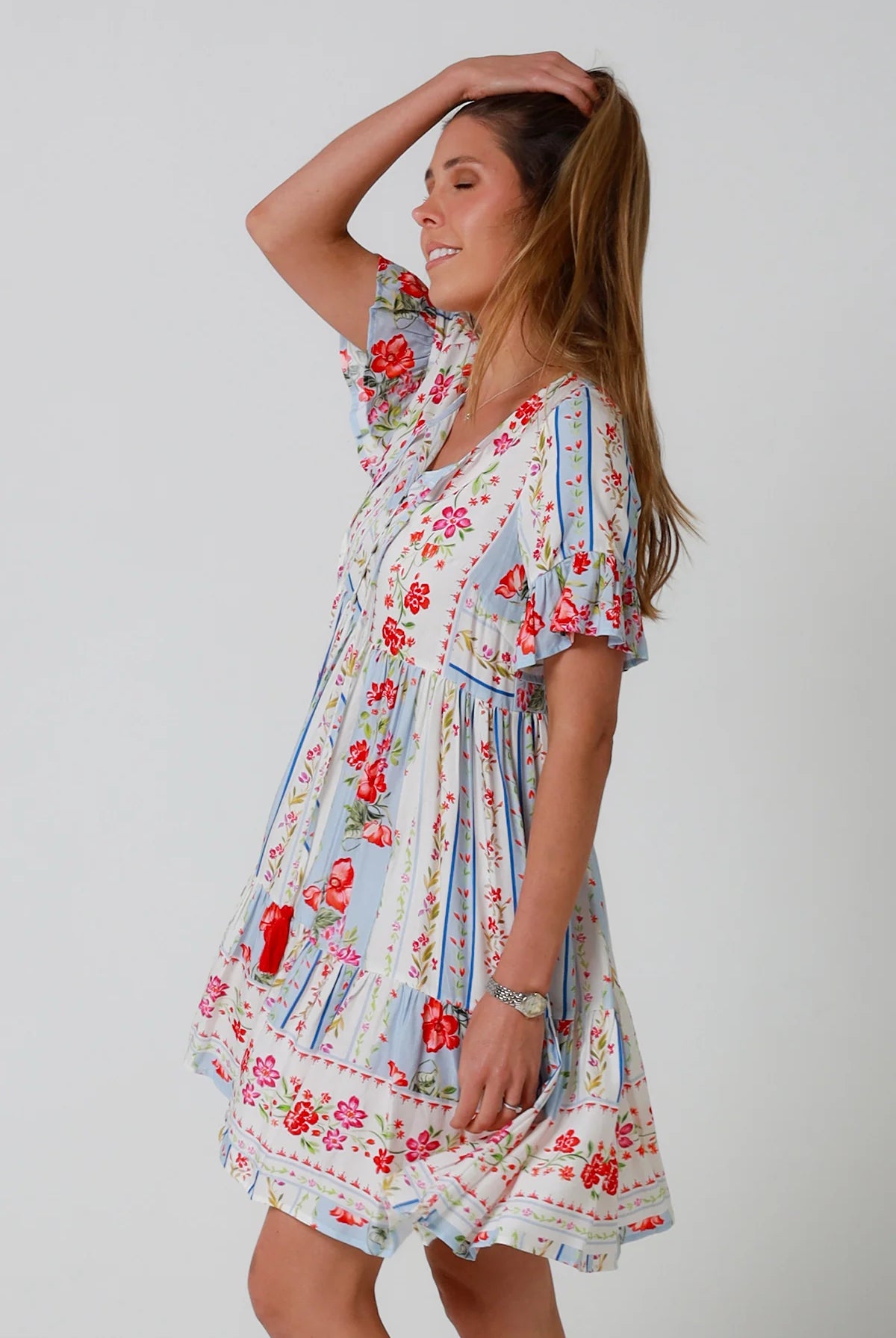 Boho mini dress with tassels v-neckline frill sleeves and border print in florals - Cherry Blossom Mini Dress Australia