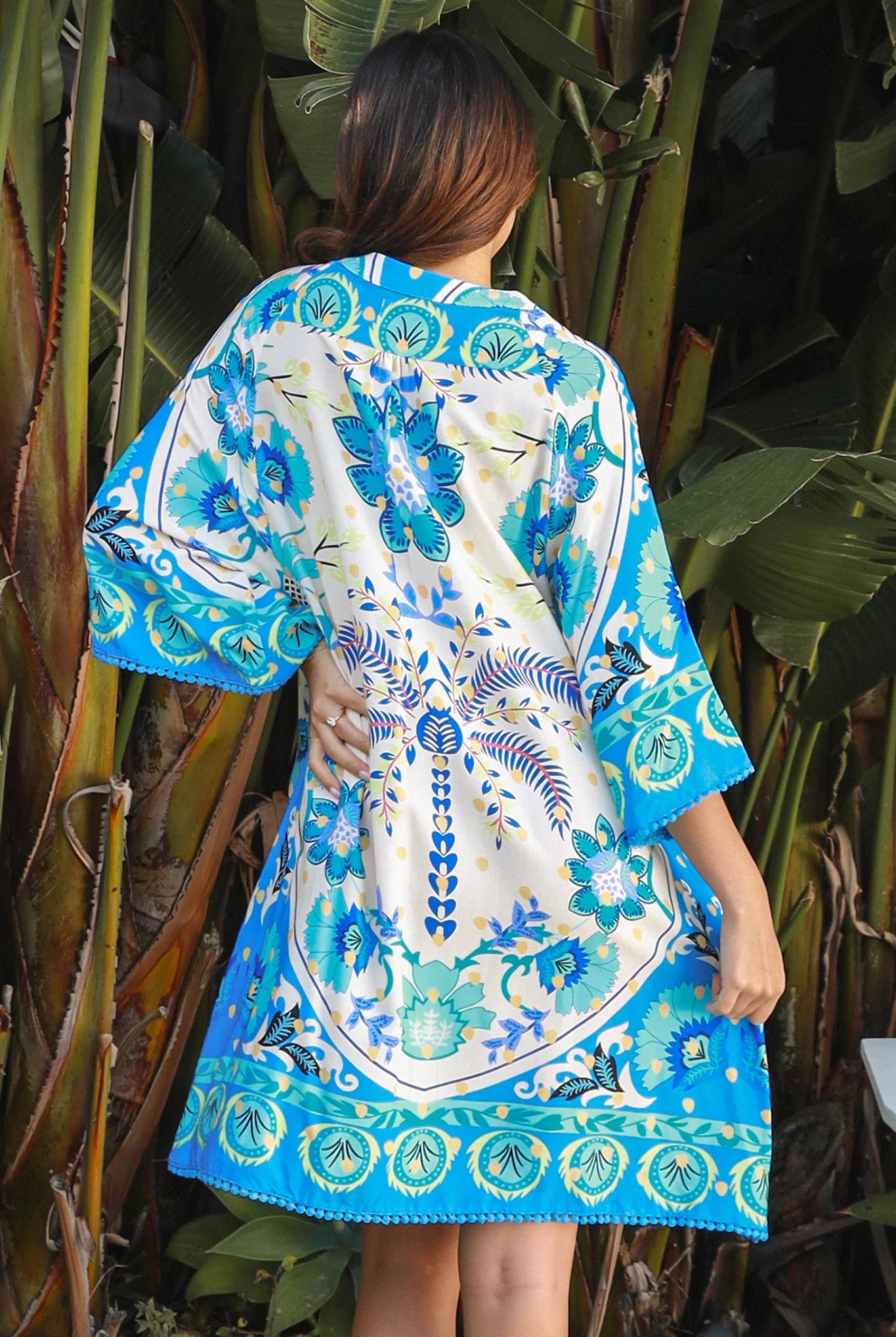 Dreamcatcher Azure Palm rayon mini dress with crochet kimono sleeves and crochet hem
