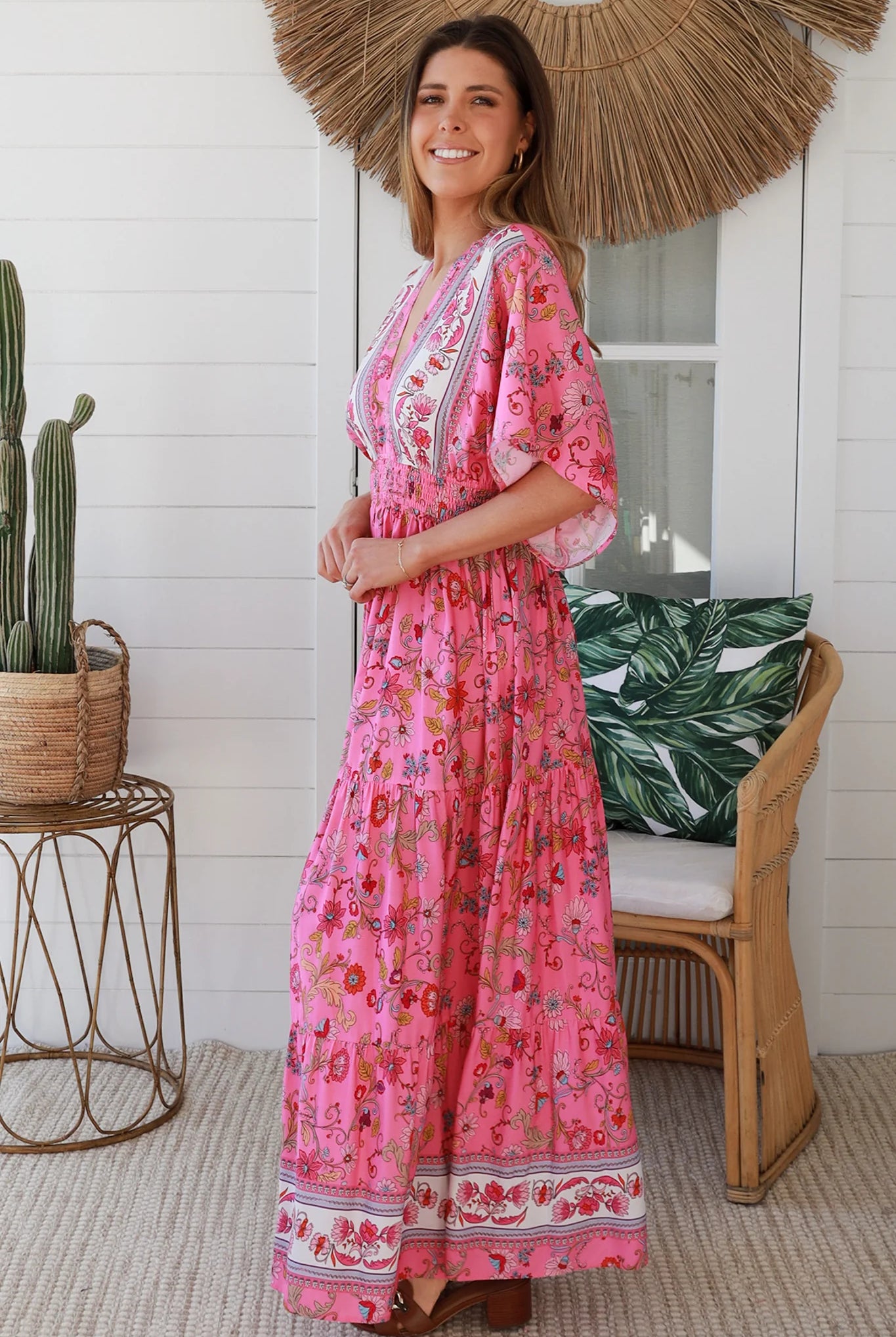 Boho maxi dress Australia in pink floral rayon with tiered skirt border print neckline summer beach style - Eliana Bloom.
