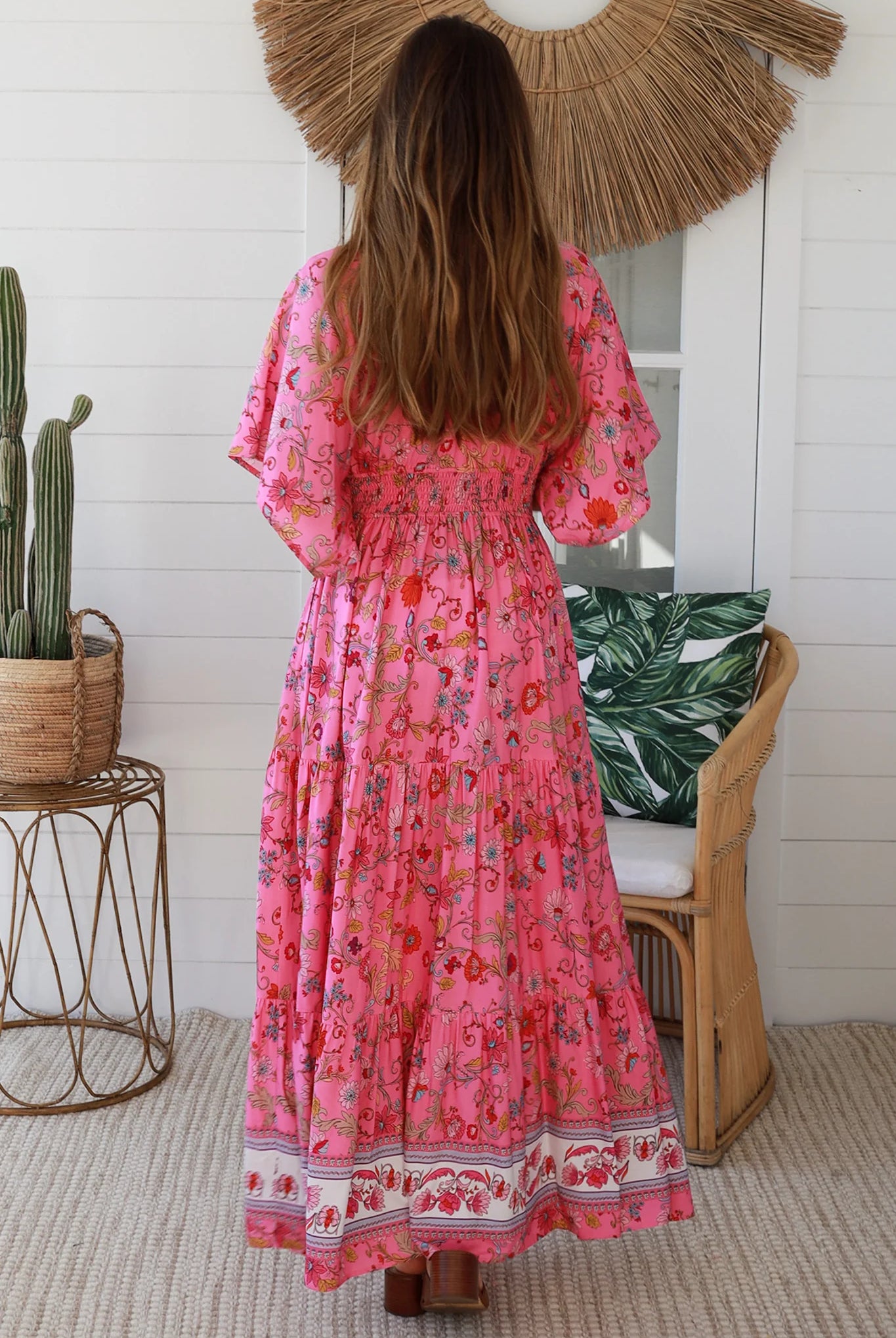 Boho maxi dress Australia in pink floral rayon with tiered skirt border print neckline summer beach style - Eliana Bloom.