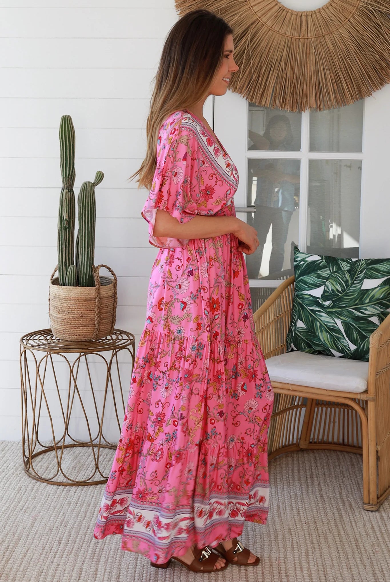 Boho maxi dress Australia in pink floral rayon with tiered skirt border print neckline summer beach style - Eliana Bloom.