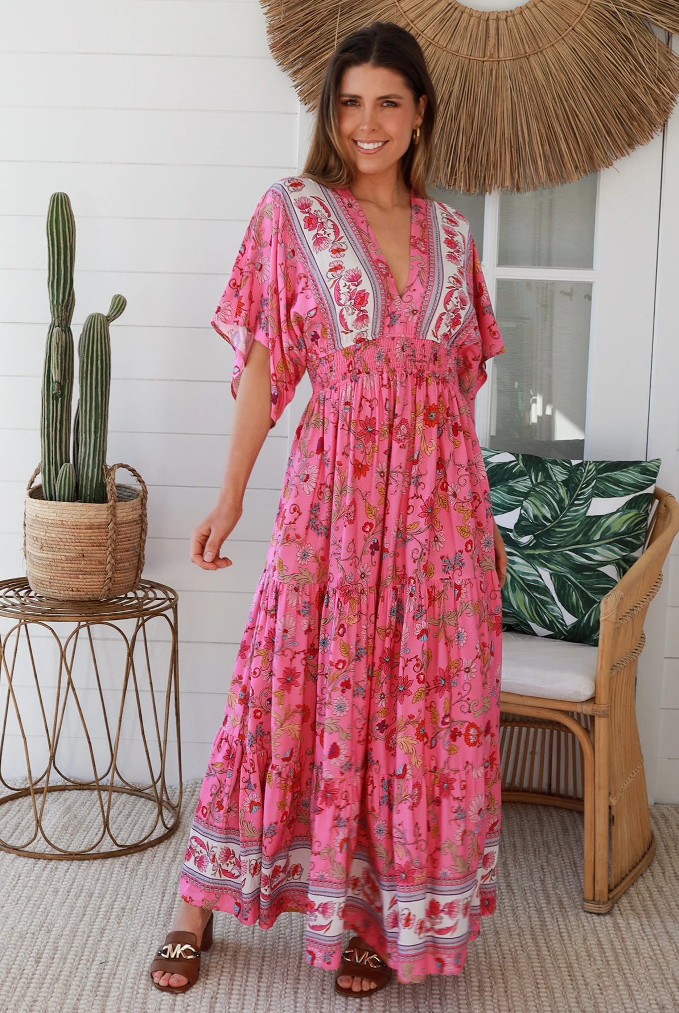 Boho maxi dress Australia in pink floral rayon with tiered skirt border print neckline summer beach style - Eliana Bloom.
