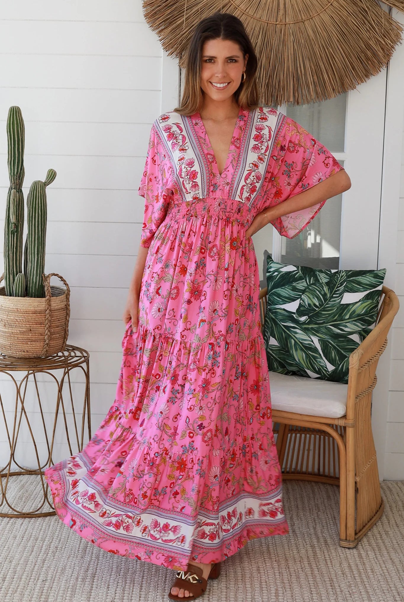 Boho maxi dress Australia in pink floral rayon with tiered skirt border print neckline summer beach style - Eliana Bloom.