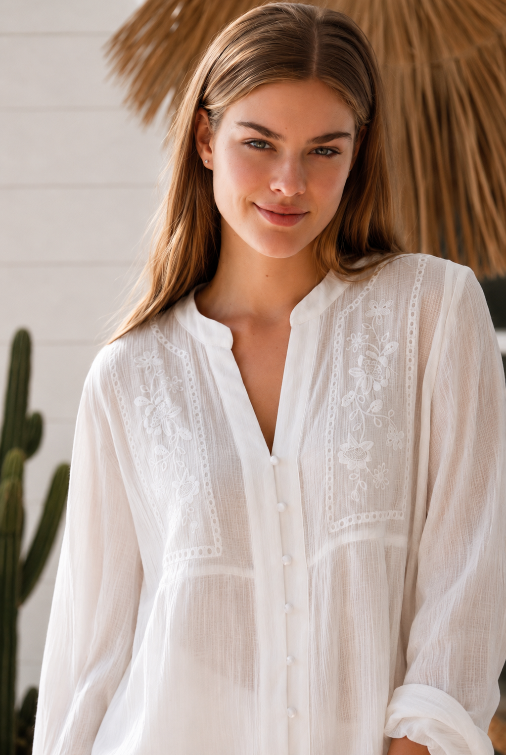 Paige white embroidered blouse by Salty Palm with floral panels, split neckline and long relaxed sleeves
