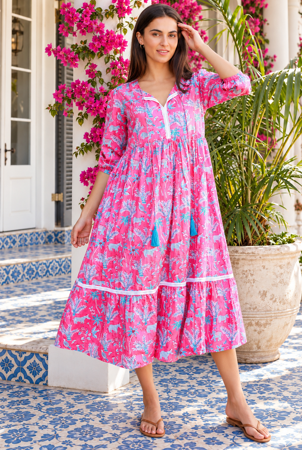 Mahale Sanctuary Midi Dress Pluto Pink in 100% cotton with turquoise wildlife print, white lace trim and frill hem