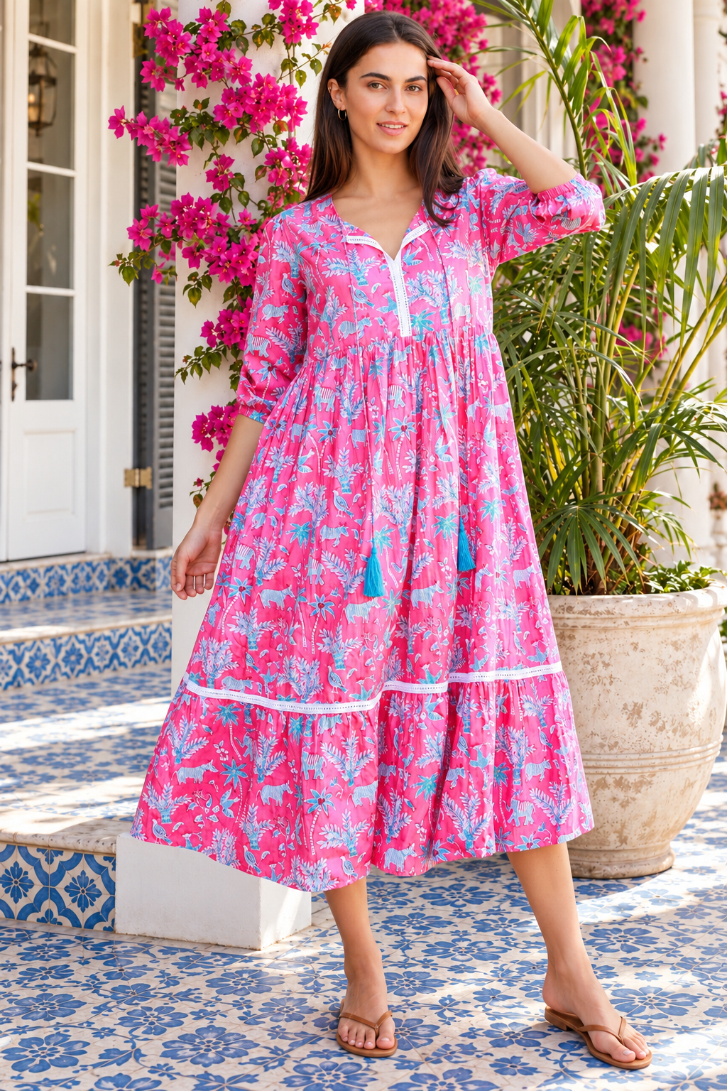 Mahale Sanctuary Midi Dress Pluto Pink in 100% cotton with turquoise wildlife print, white lace trim and frill hem
