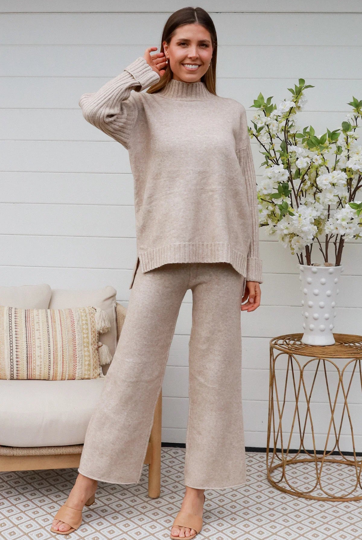 Woman in vanilla knit lounge set with ribbed sweater and wide-leg pants - boho knitwear co-ord set - Bohemian Love Runway.
