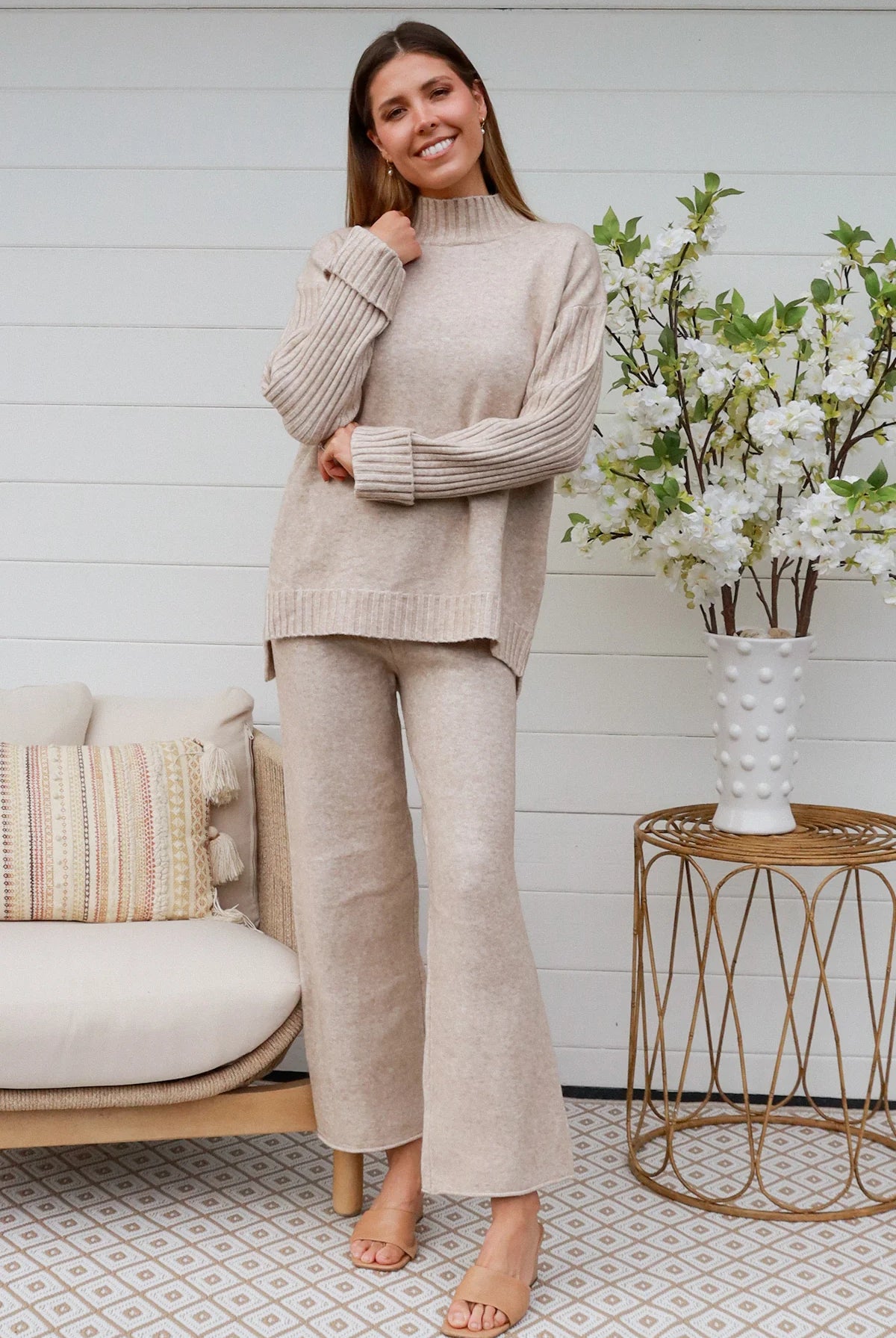 Woman in vanilla knit lounge set with ribbed sweater and wide-leg pants - boho knitwear co-ord set - Bohemian Love Runway.