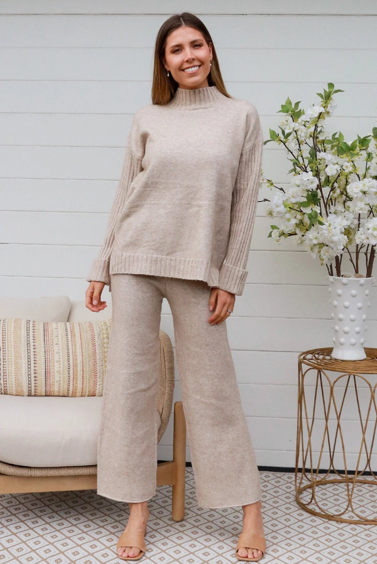 Woman in vanilla knit lounge set with ribbed sweater and wide-leg pants - boho knitwear co-ord set - Bohemian Love Runway.