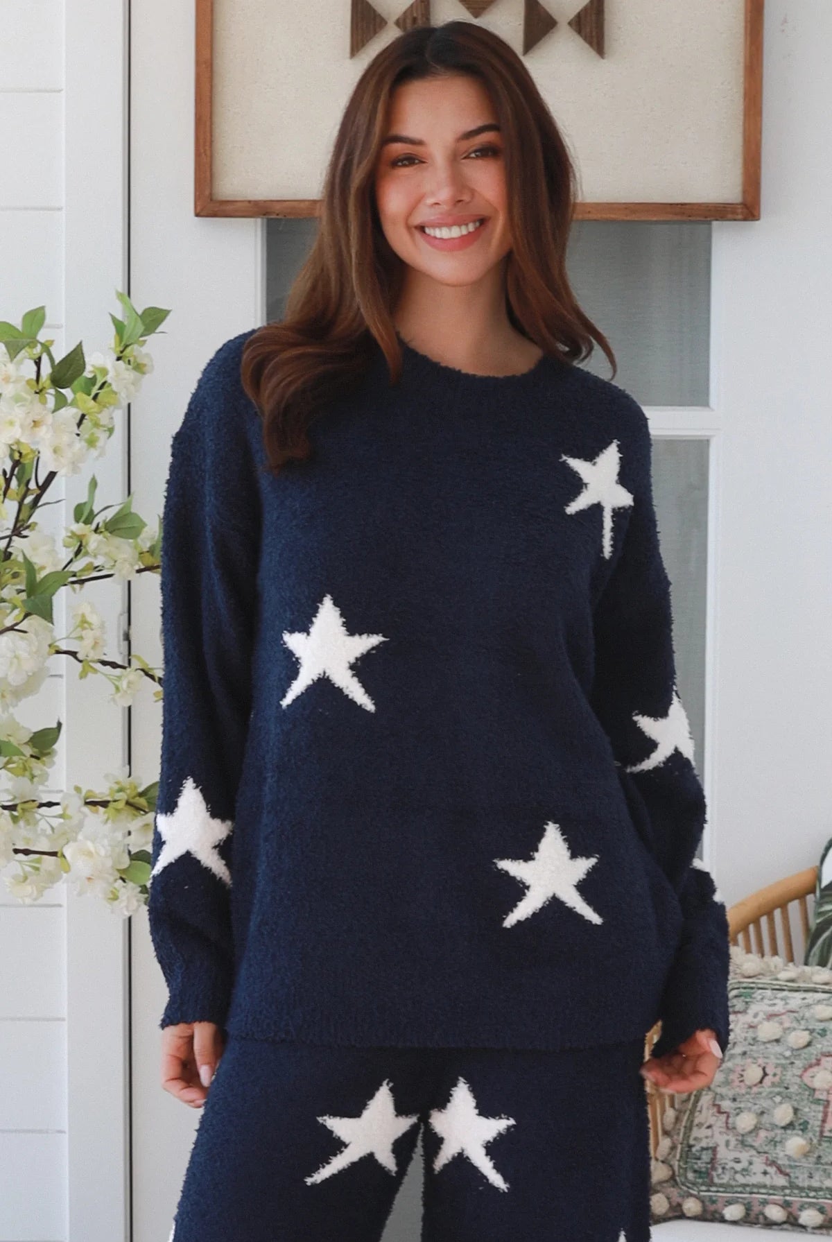 Charlotte The Label Star Soft Brushed Knit Pants in navy featuring a soft brushed knit, closely placed white star design, wide-leg silhouette and elastic waistband.