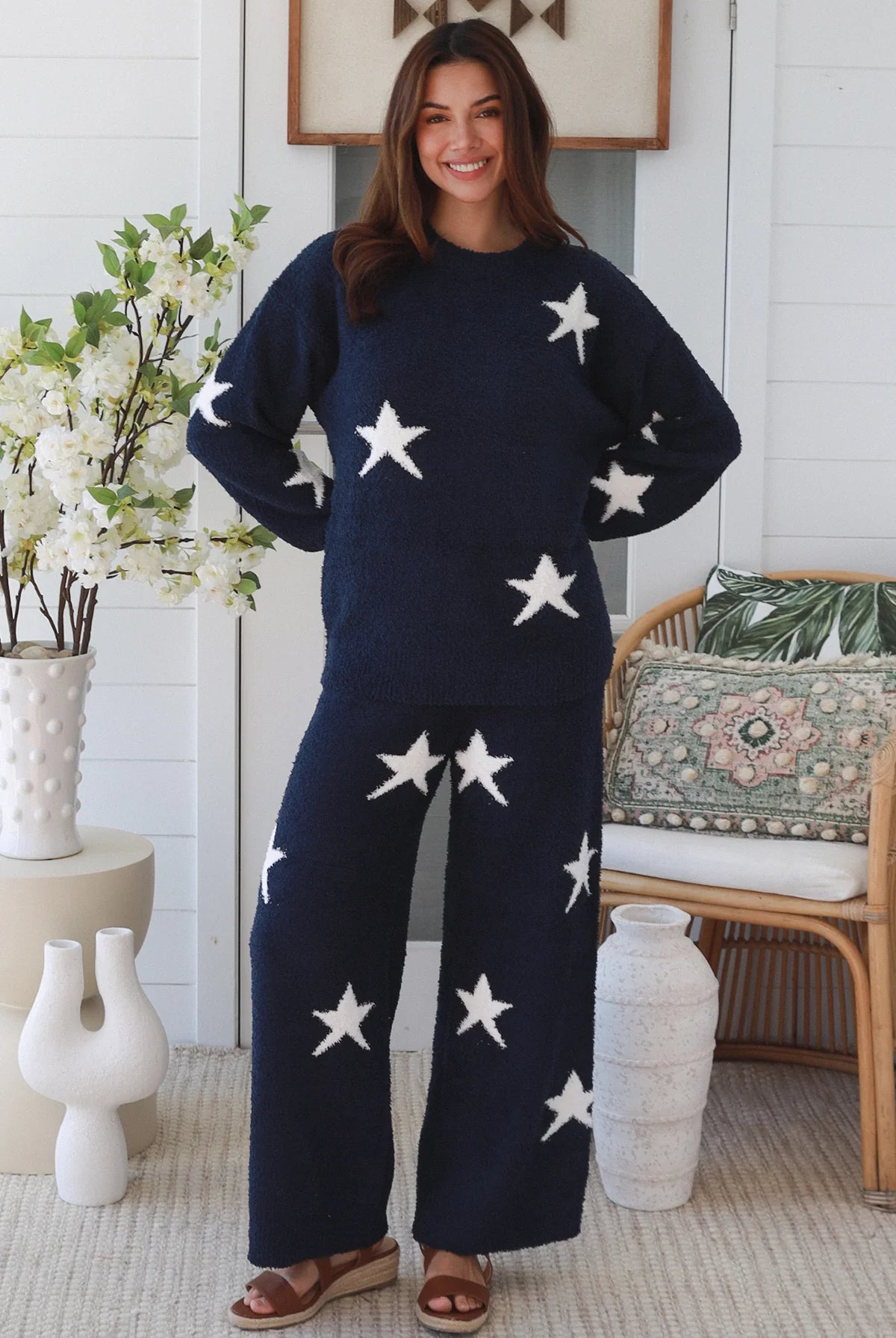 Charlotte The Label Star Soft Brushed Knit Pants in navy featuring a soft brushed knit, closely placed white star design, wide-leg silhouette and elastic waistband.