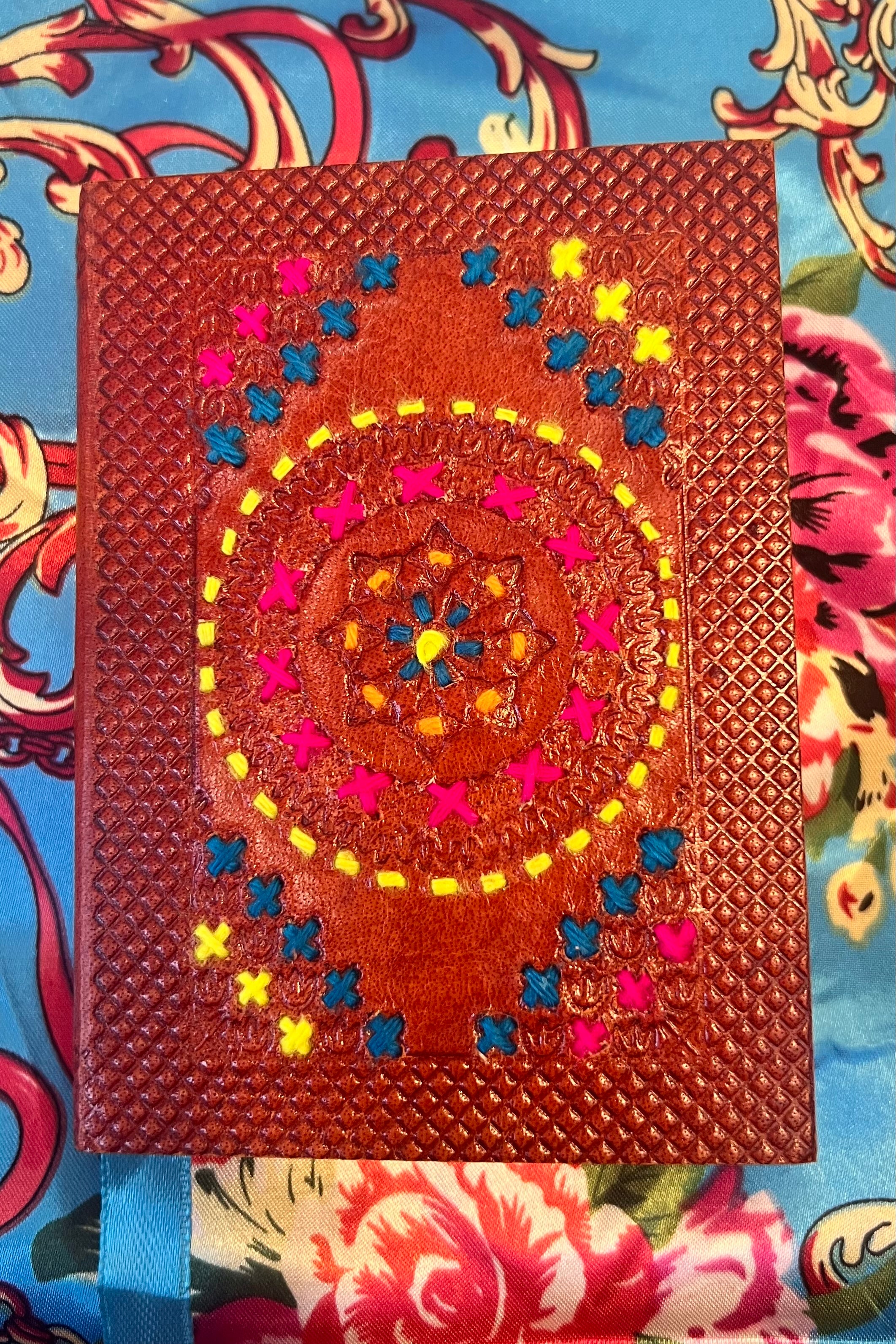 Hand-tooled leather B5 journal with colourful embroidered mandala and sky-blue ribbon - artisan boho notebook.