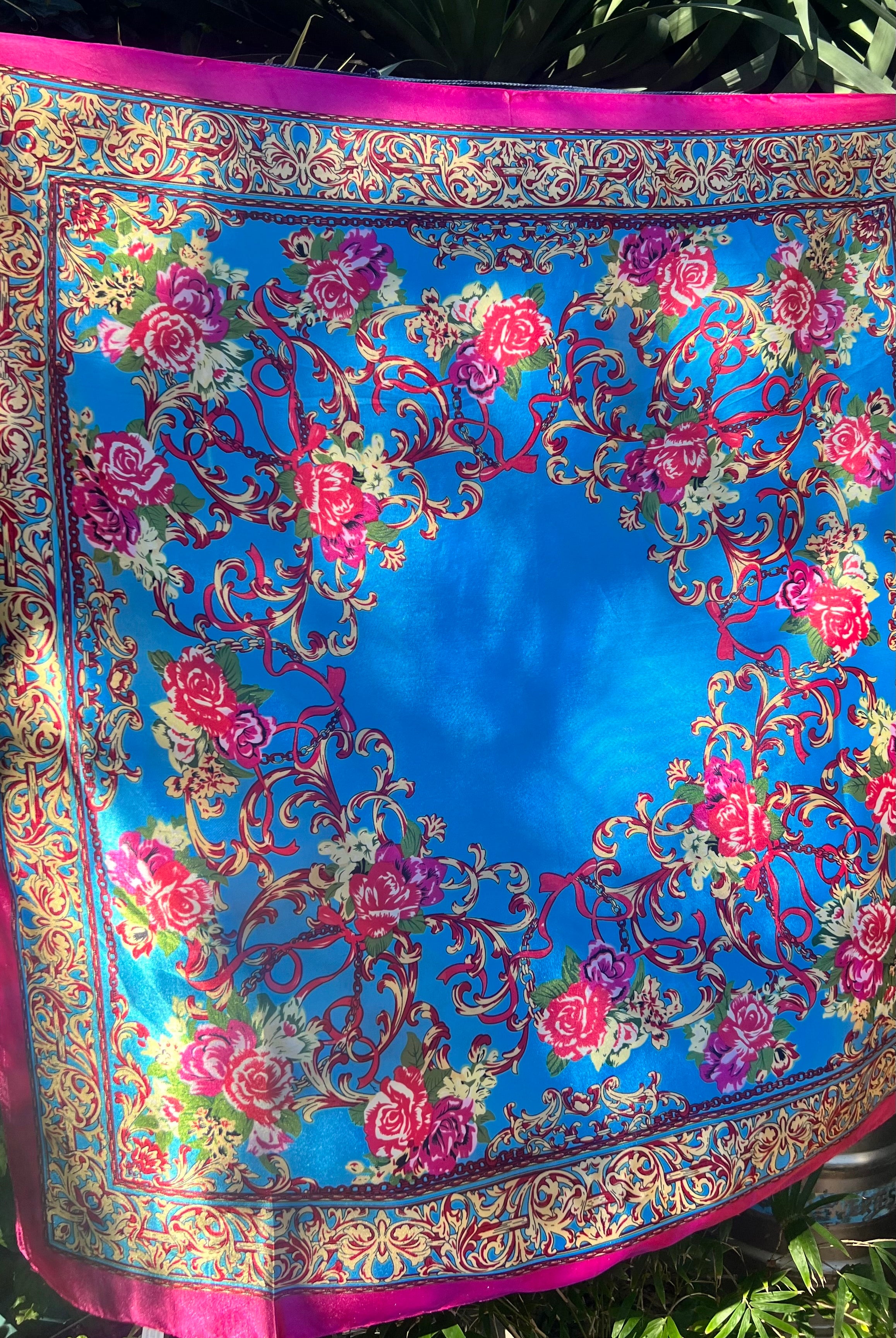 Cerulean scarf with gold scrolls, pink and crimson rose, and a fuchsia border. 90x90cm. Silk satin feel.