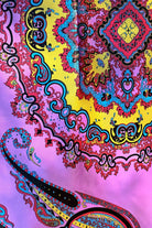Bright silk satin scarf with paisley and mandala print in lilac, yellow, coral and teal. 90x90cm. Polyester with luxe sheen.