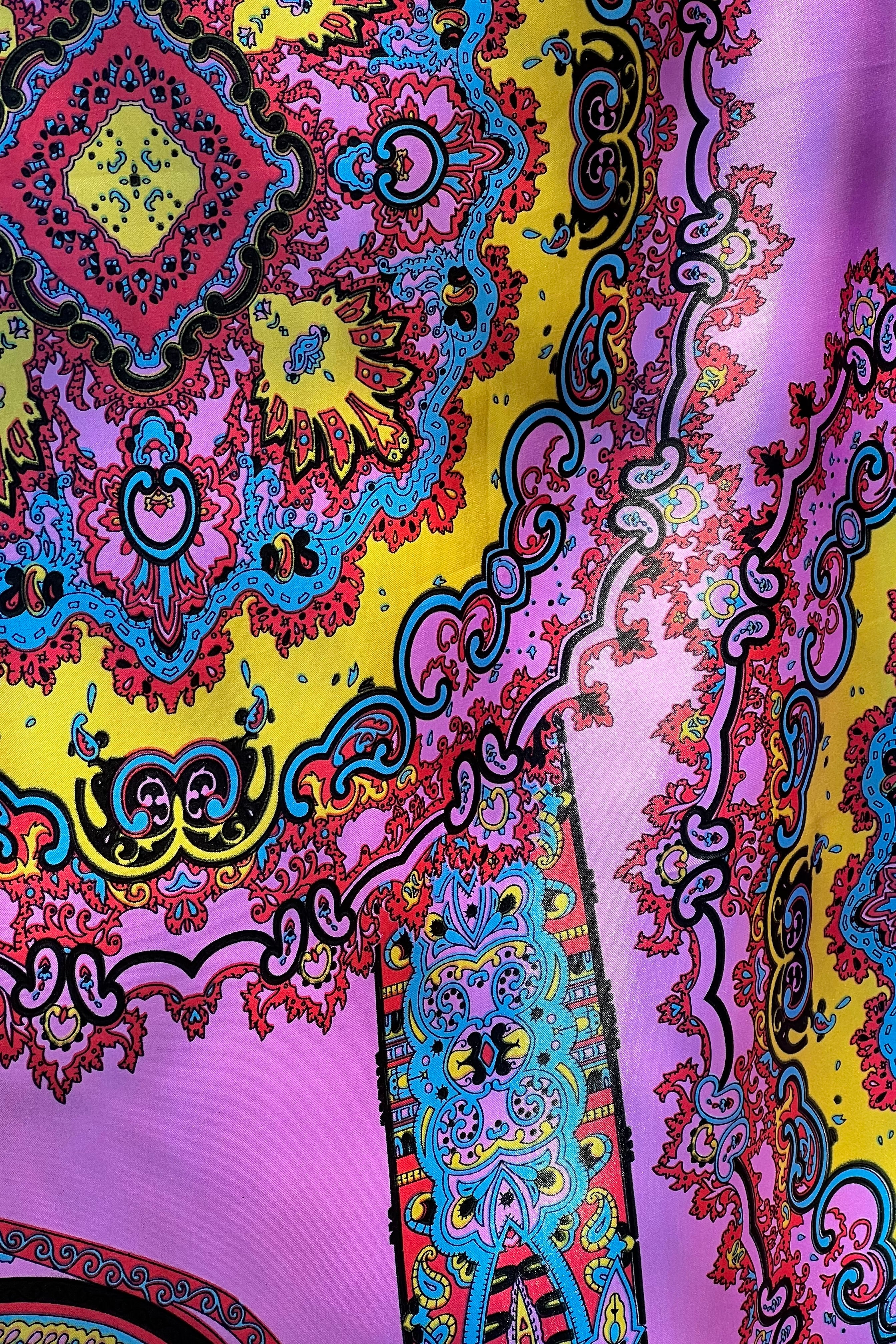 Bright silk satin scarf with paisley and mandala print in lilac, yellow, coral and teal. 90x90cm. Polyester with luxe sheen.