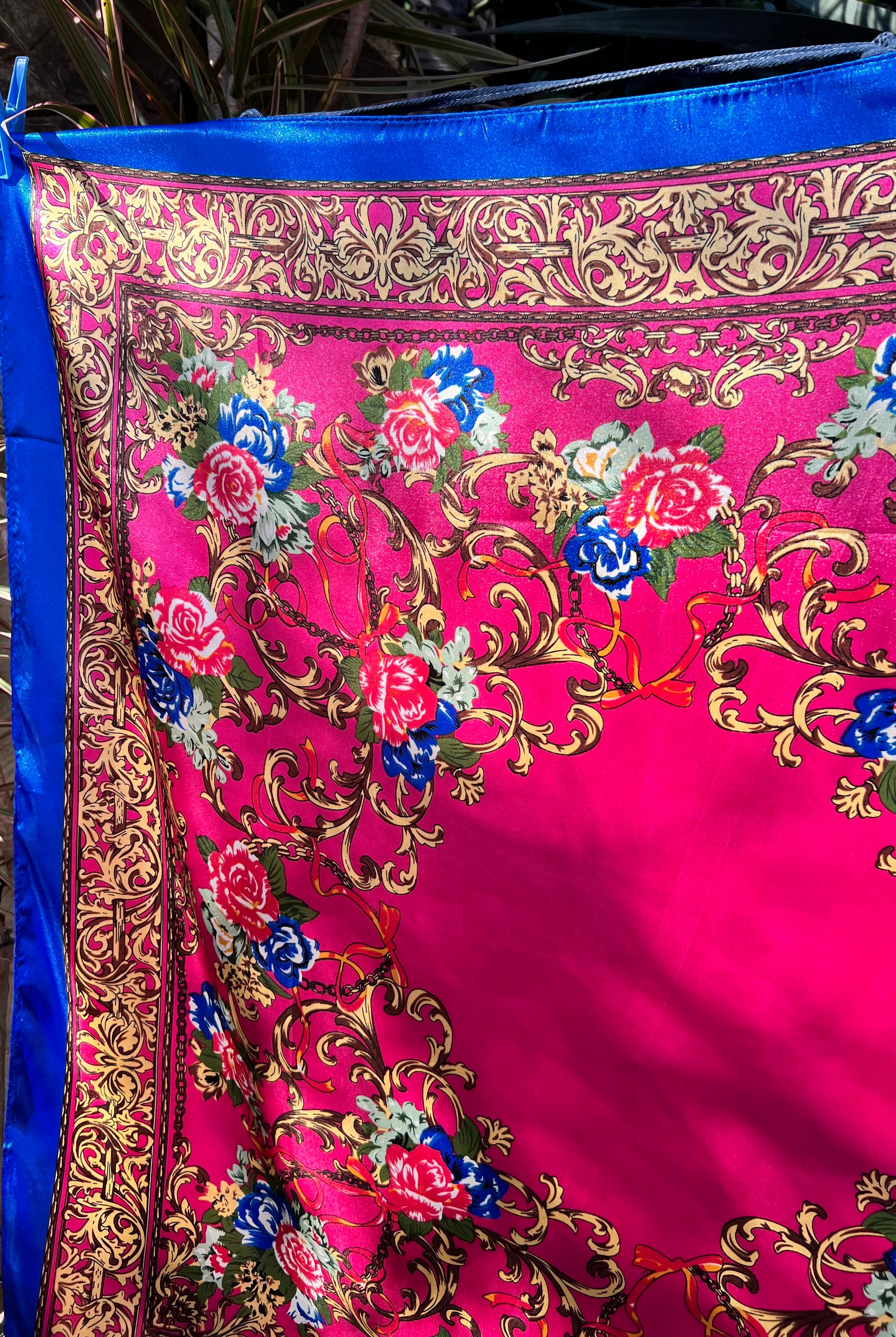 Square pink satin scarf with ornate gold filigree and red and blue floral print - Bohemian Love Runway accessory.