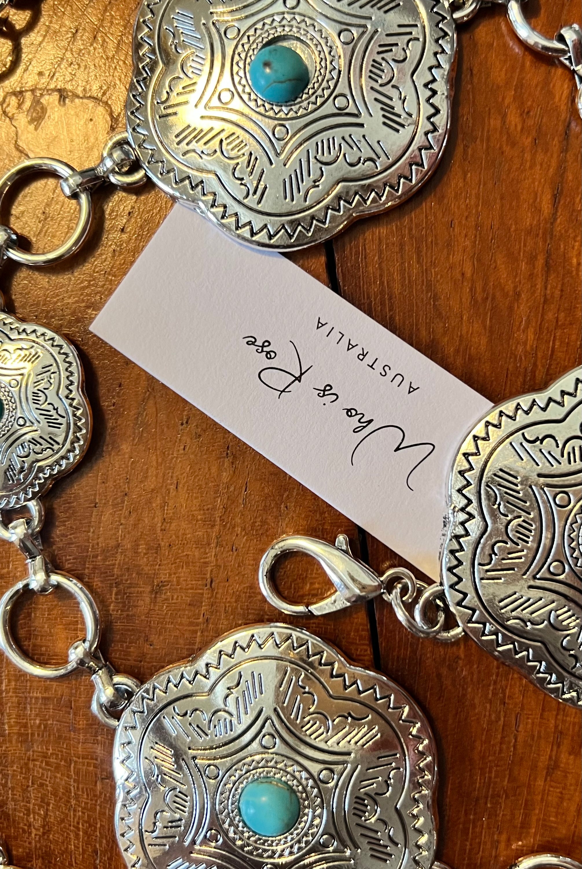 Western festival silver concho chain belt with turquoise stones - boho accessory at Bohemian Love Runway.