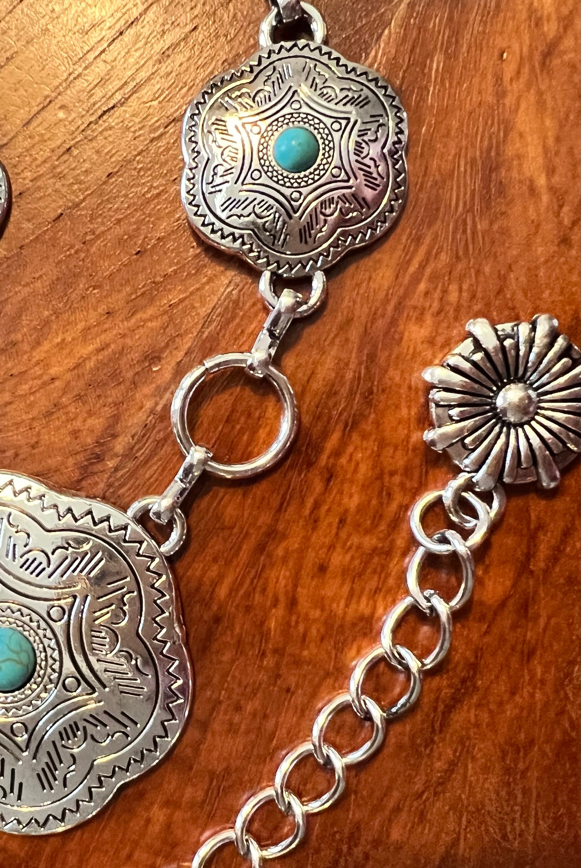 Western festival silver concho chain belt with turquoise stones - boho accessory at Bohemian Love Runway.