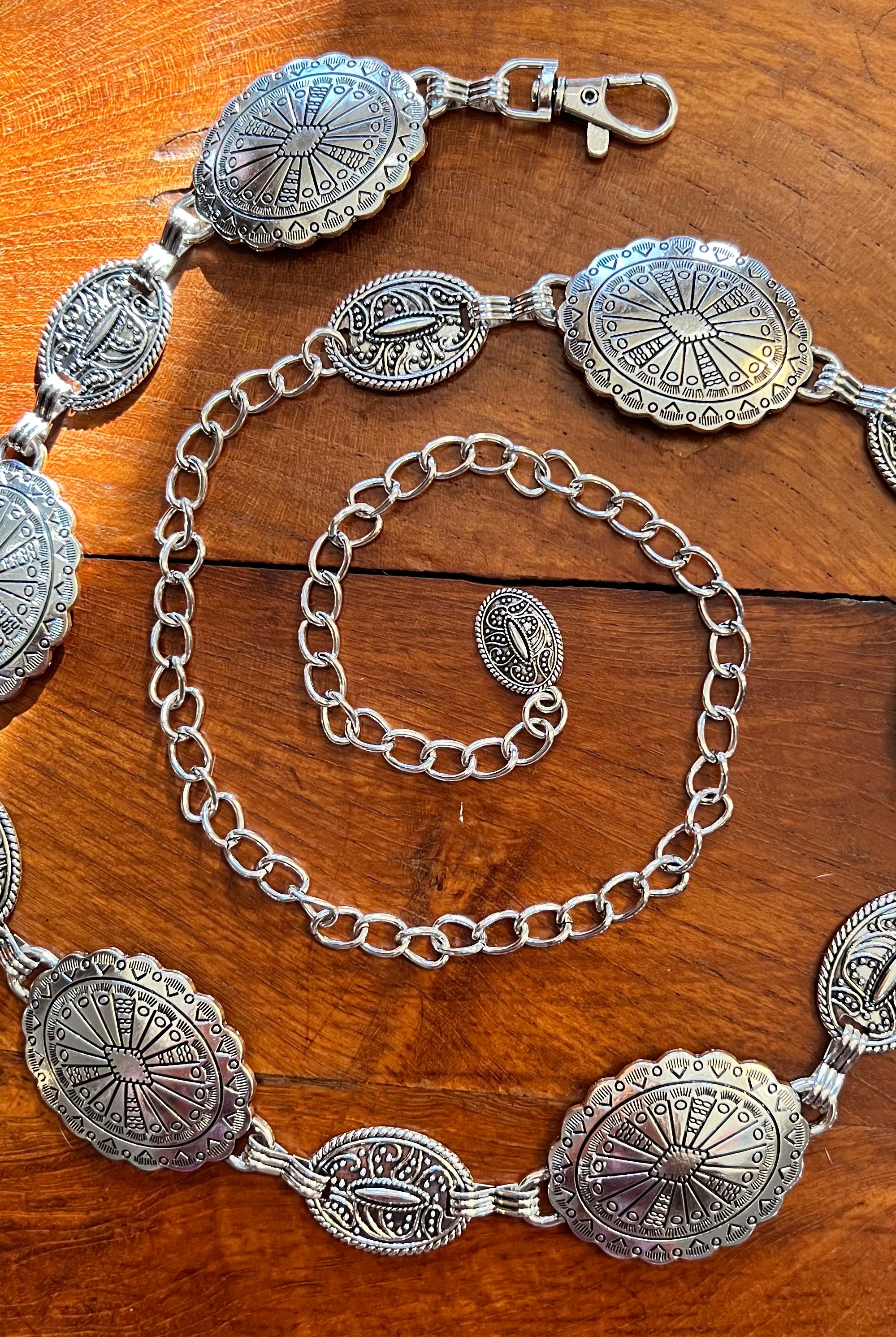 Silver finish concho chain belt with engraved oval medallion and extender - boho festival waist belt Australia.
