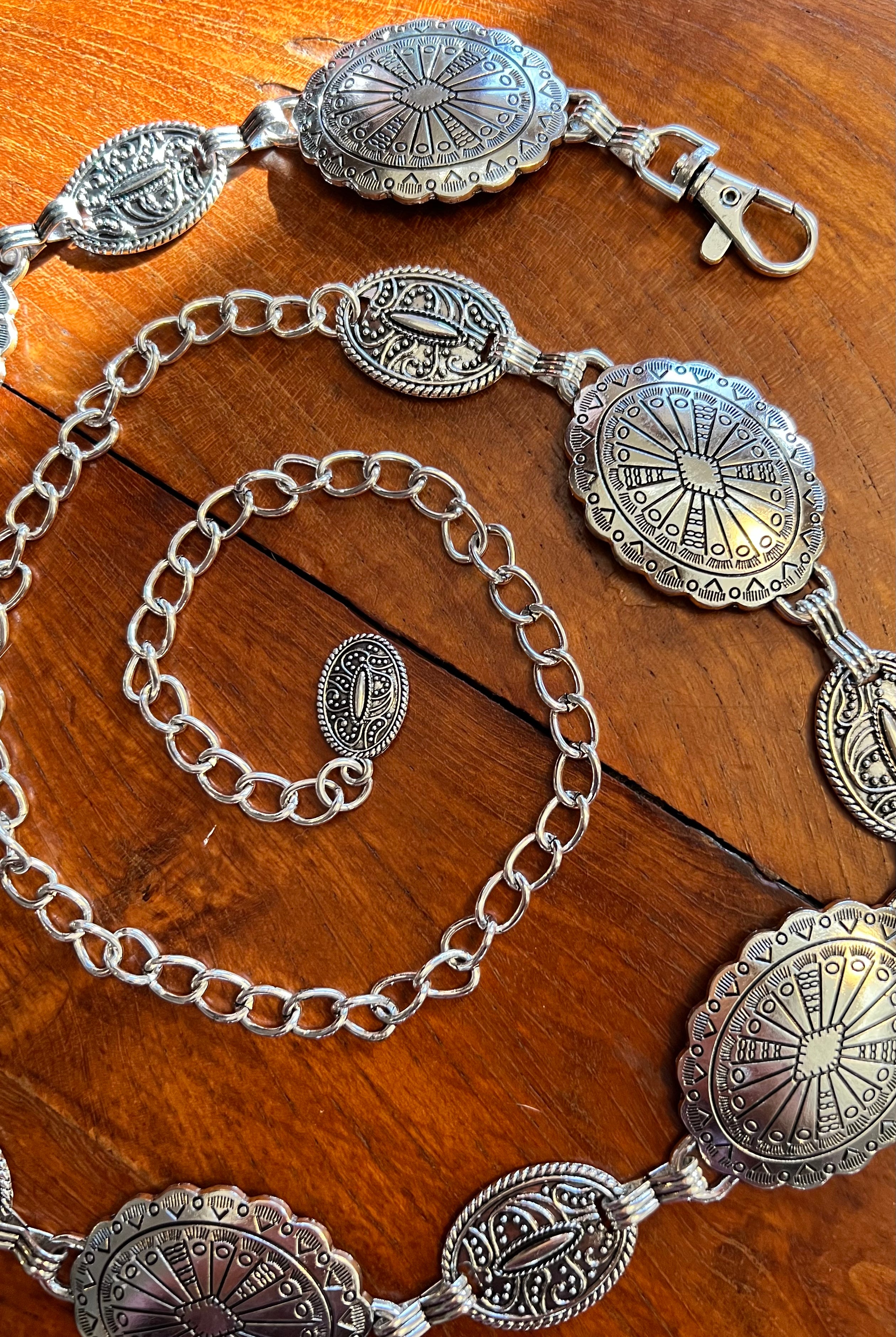 Silver finish concho chain belt with engraved oval medallion and extender - boho festival waist belt Australia.