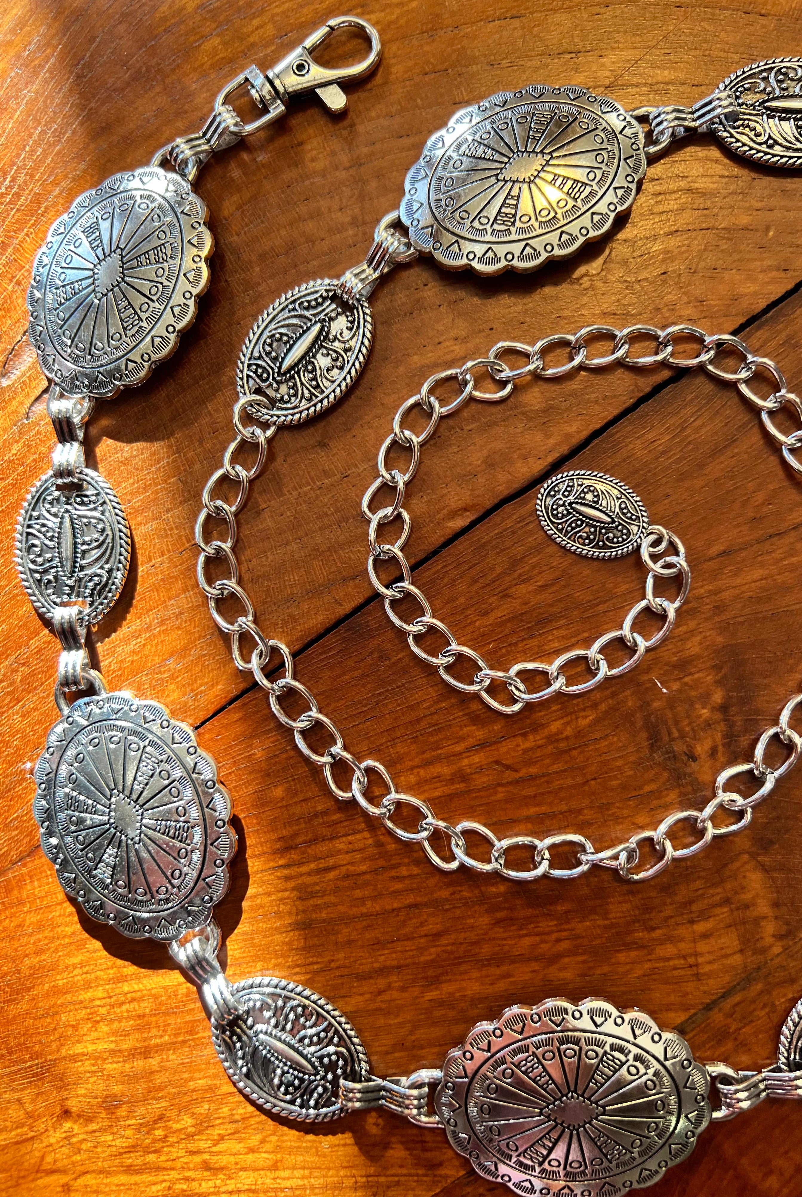 Silver finish concho chain belt with engraved oval medallion and extender - boho festival waist belt Australia.