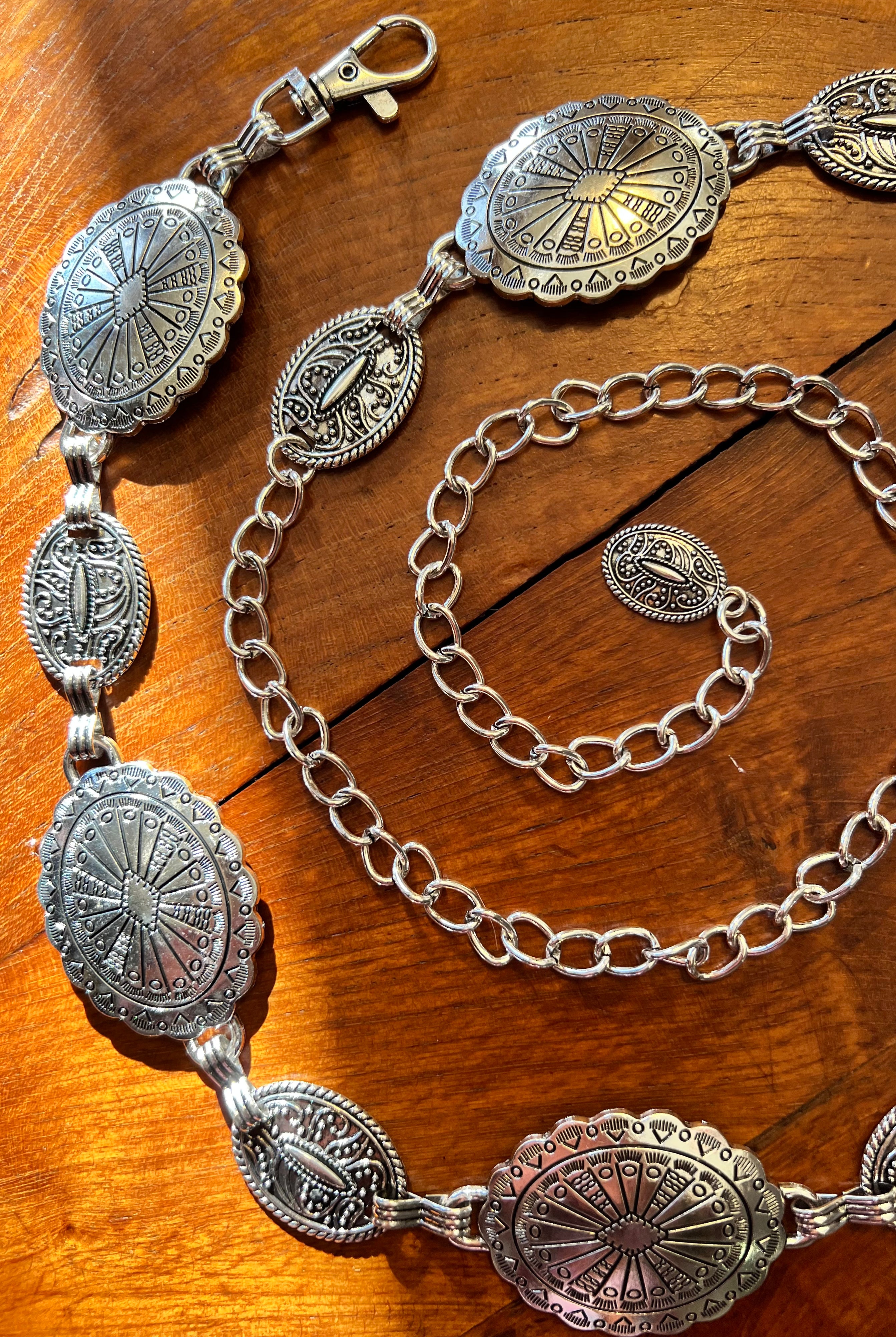 Silver finish concho chain belt with engraved oval medallion and extender - boho festival waist belt Australia.