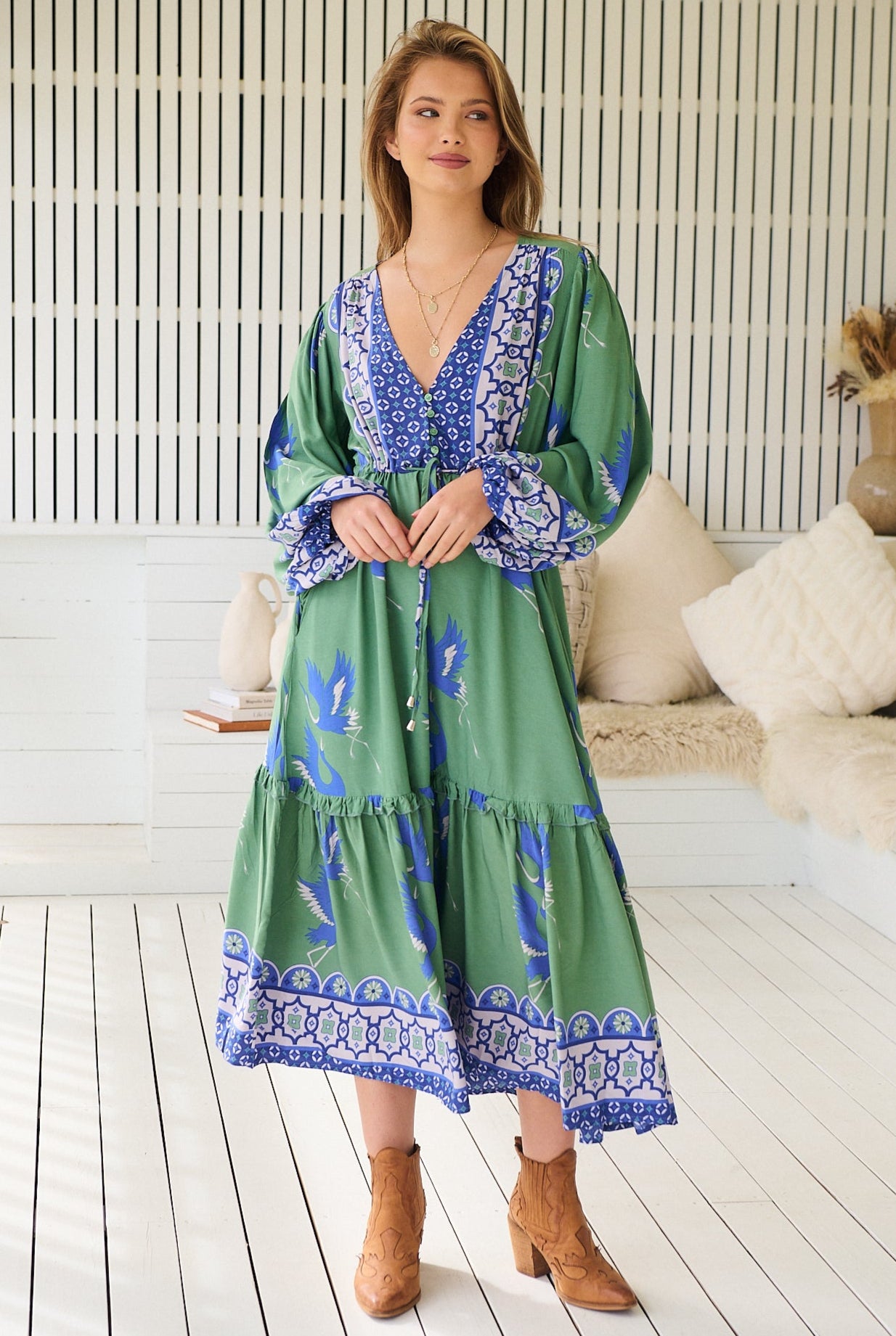 Model wearing Bluebird Willa Boho Midi Dress by Jaase - floral print, long sleeves, 100% rayon, relaxed fit.