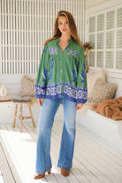 Model wears rayon Boho blouse with vintage print - feminine & effortless