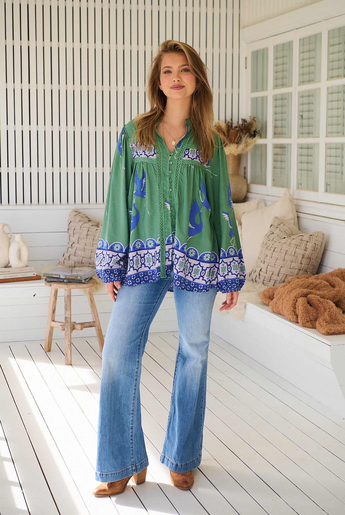 Model wears rayon Boho blouse with vintage print - feminine & effortless