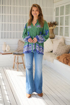 Model wears rayon Boho blouse with vintage print - feminine & effortless