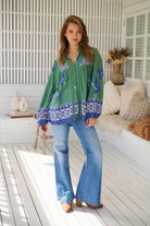 Model wears rayon Boho blouse with vintage print - feminine & effortless