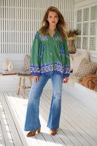 Model wears rayon Boho blouse with vintage print - feminine & effortless