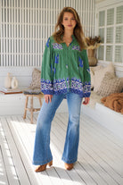 Model wears rayon Boho blouse with vintage print - feminine & effortless