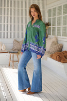 Model wears rayon Boho blouse with vintage print - feminine & effortless