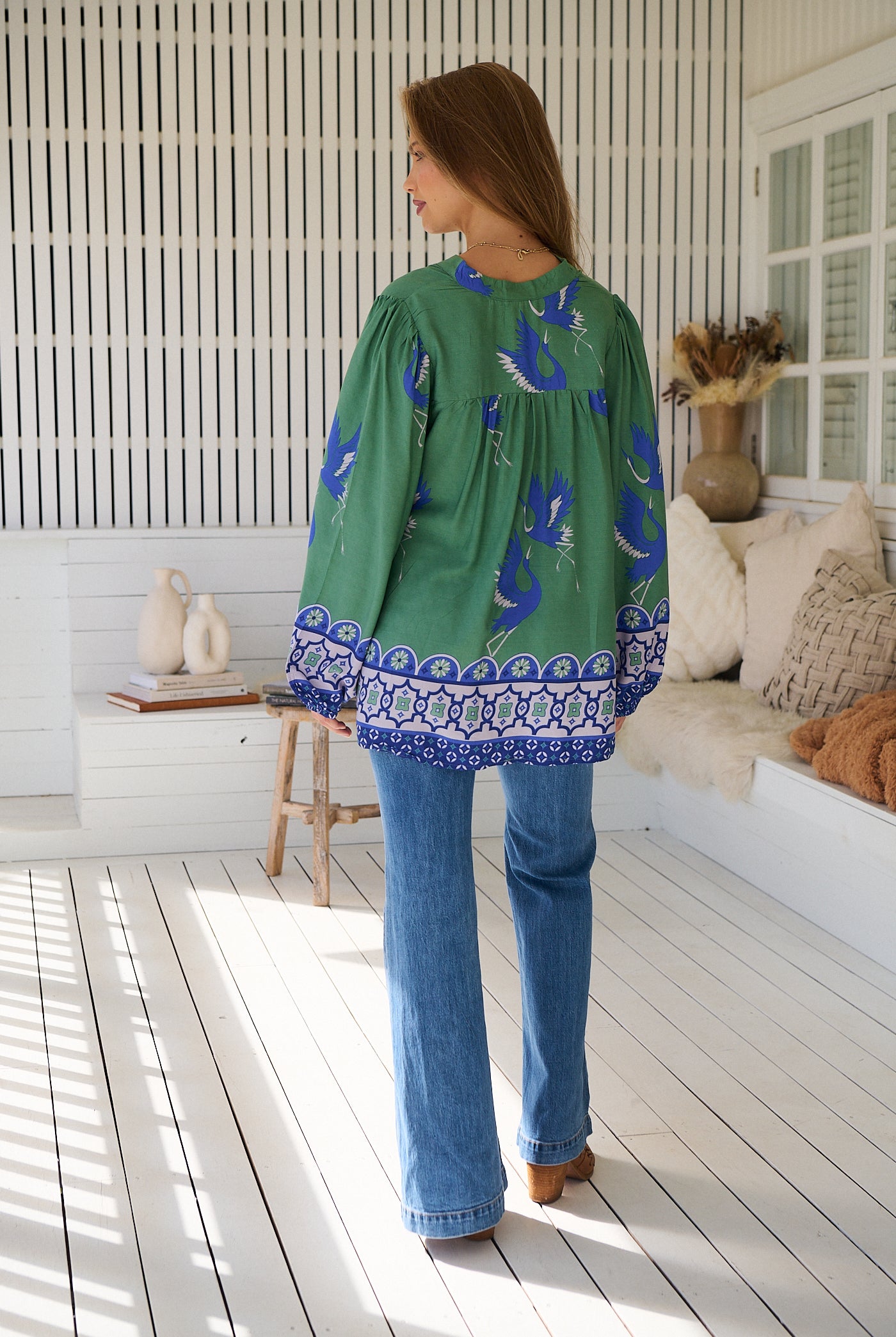 Model wears rayon Boho blouse with vintage print - feminine & effortless