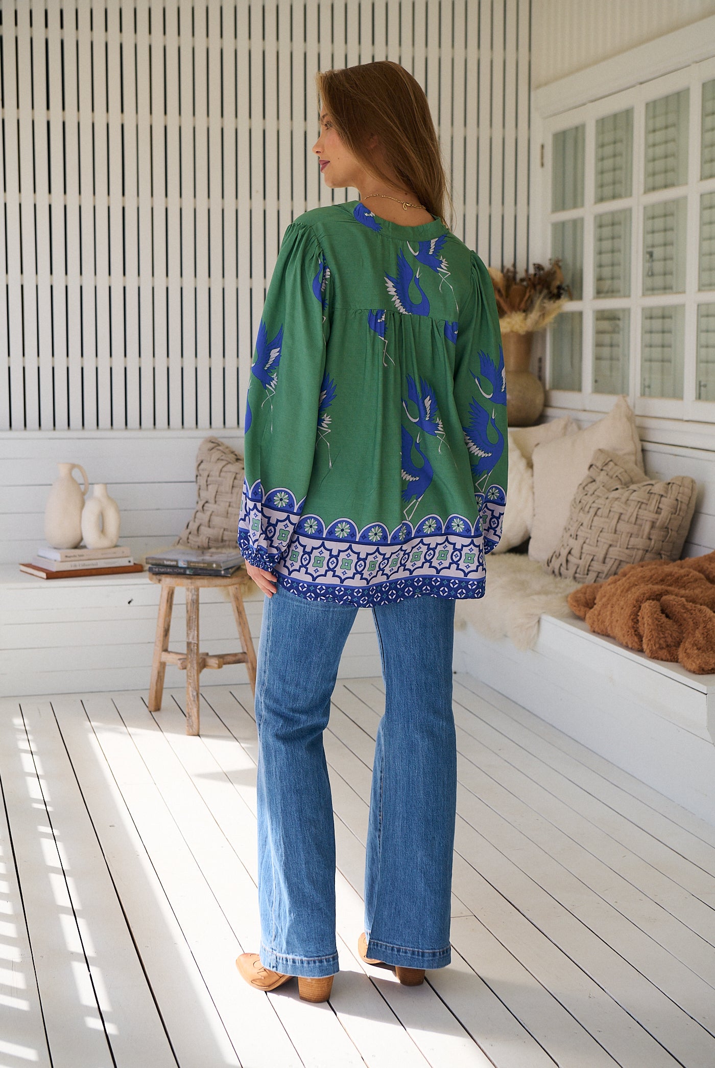 Model wears rayon Boho blouse with vintage print - feminine & effortless